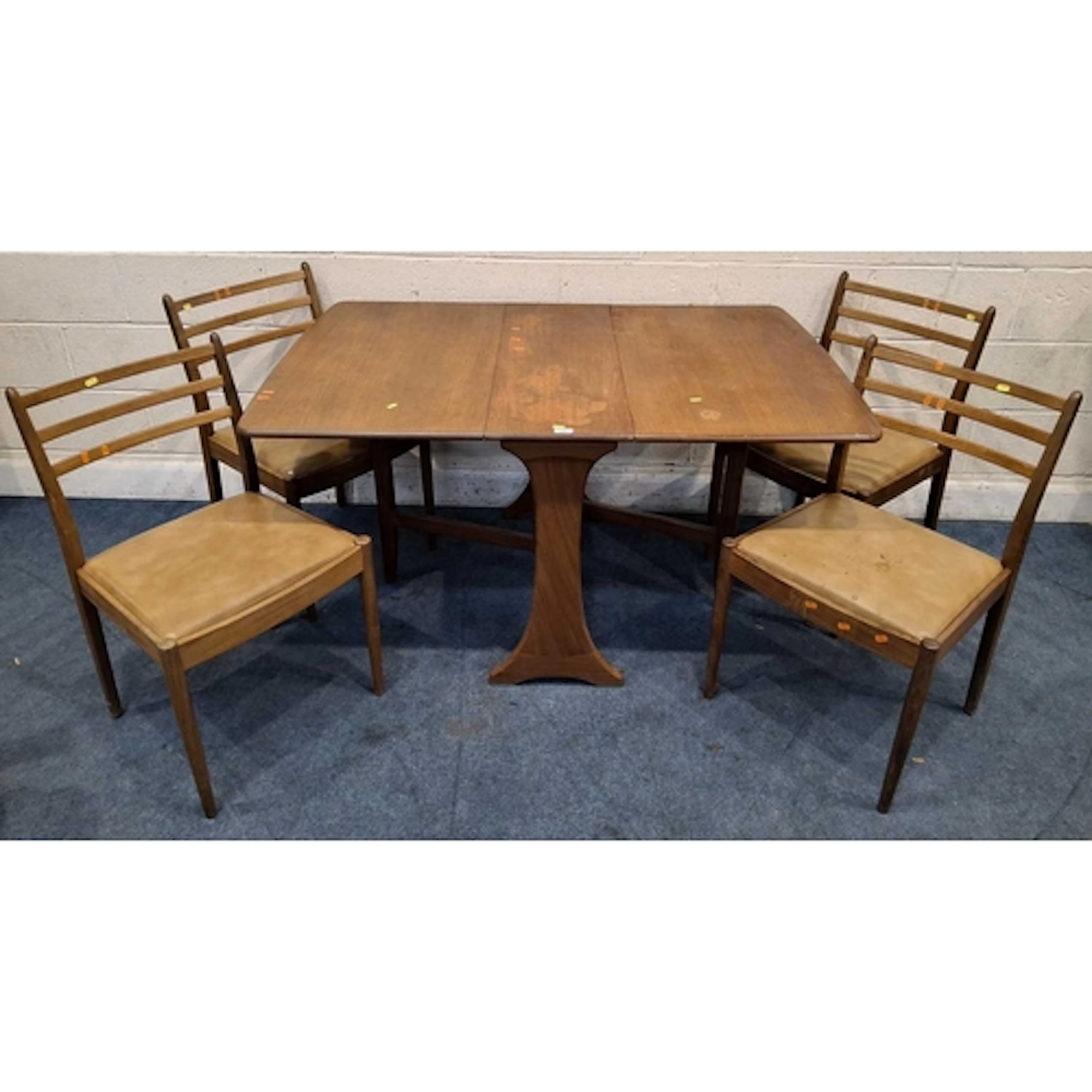 G PLAN, A MID-CENTURY TEAK GATE LEG TABLE, raised on trestle...