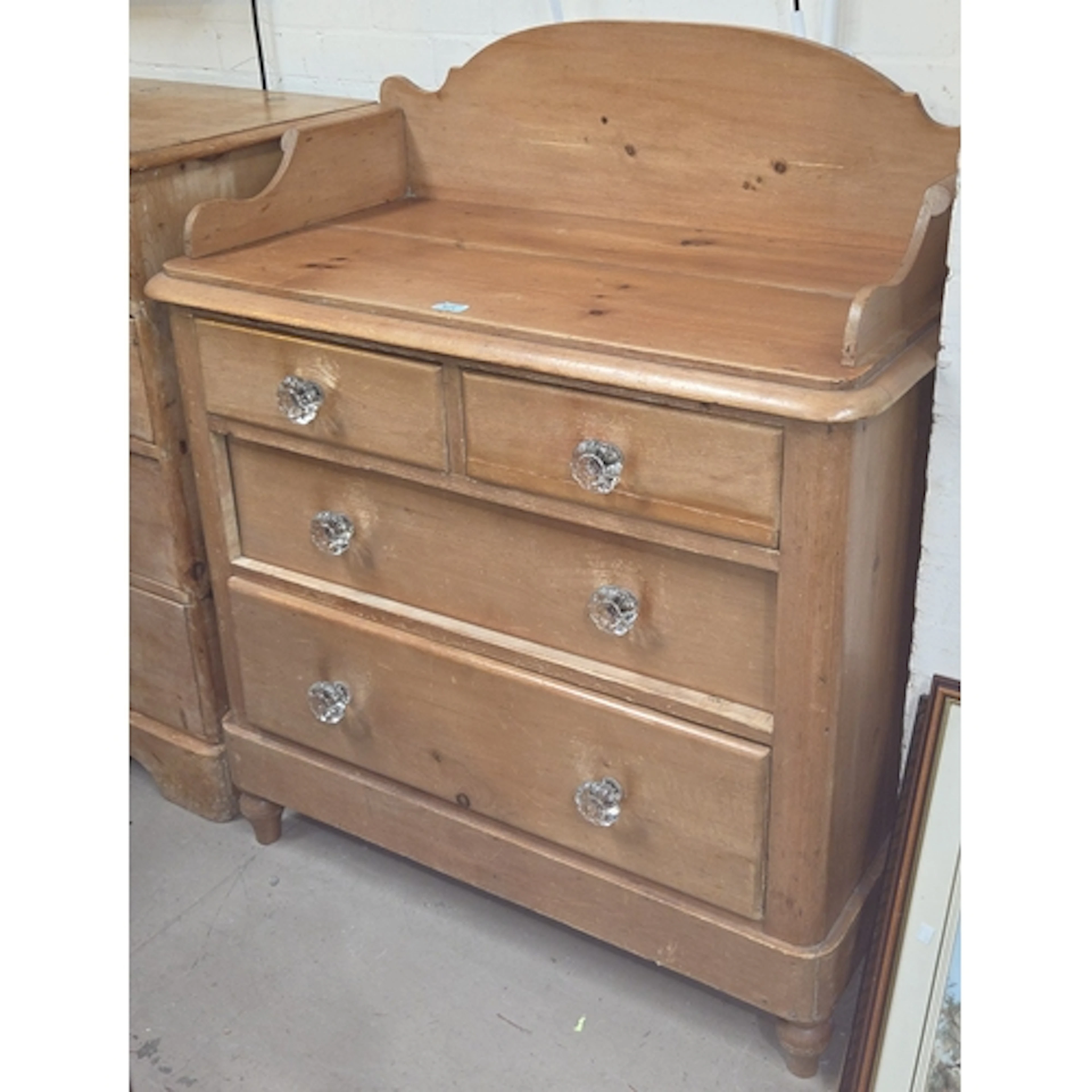 A Victorian stripped pine chest of 2 long and two short draw...