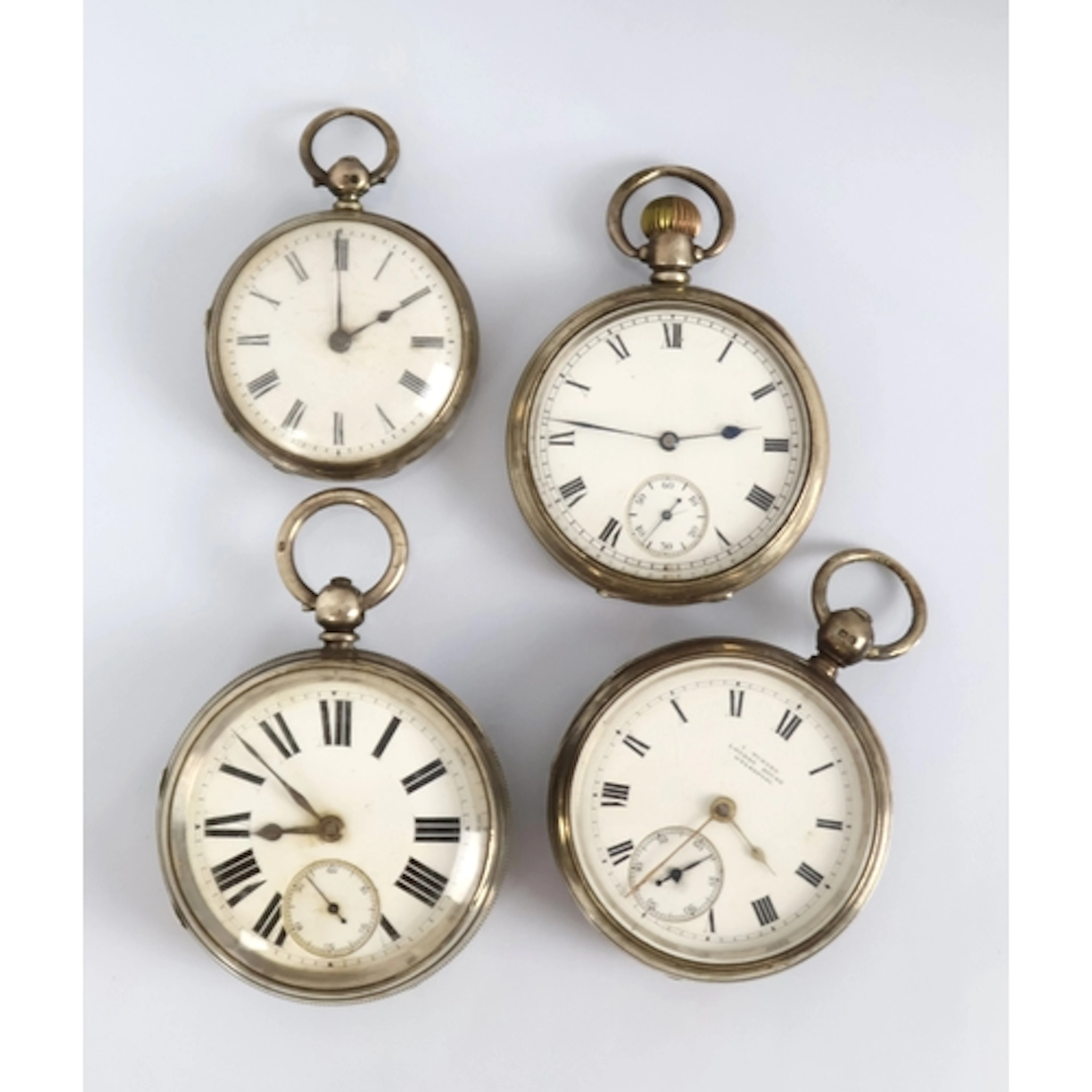 A silver cased open face pocket watch, Birmingham 1911, the ...