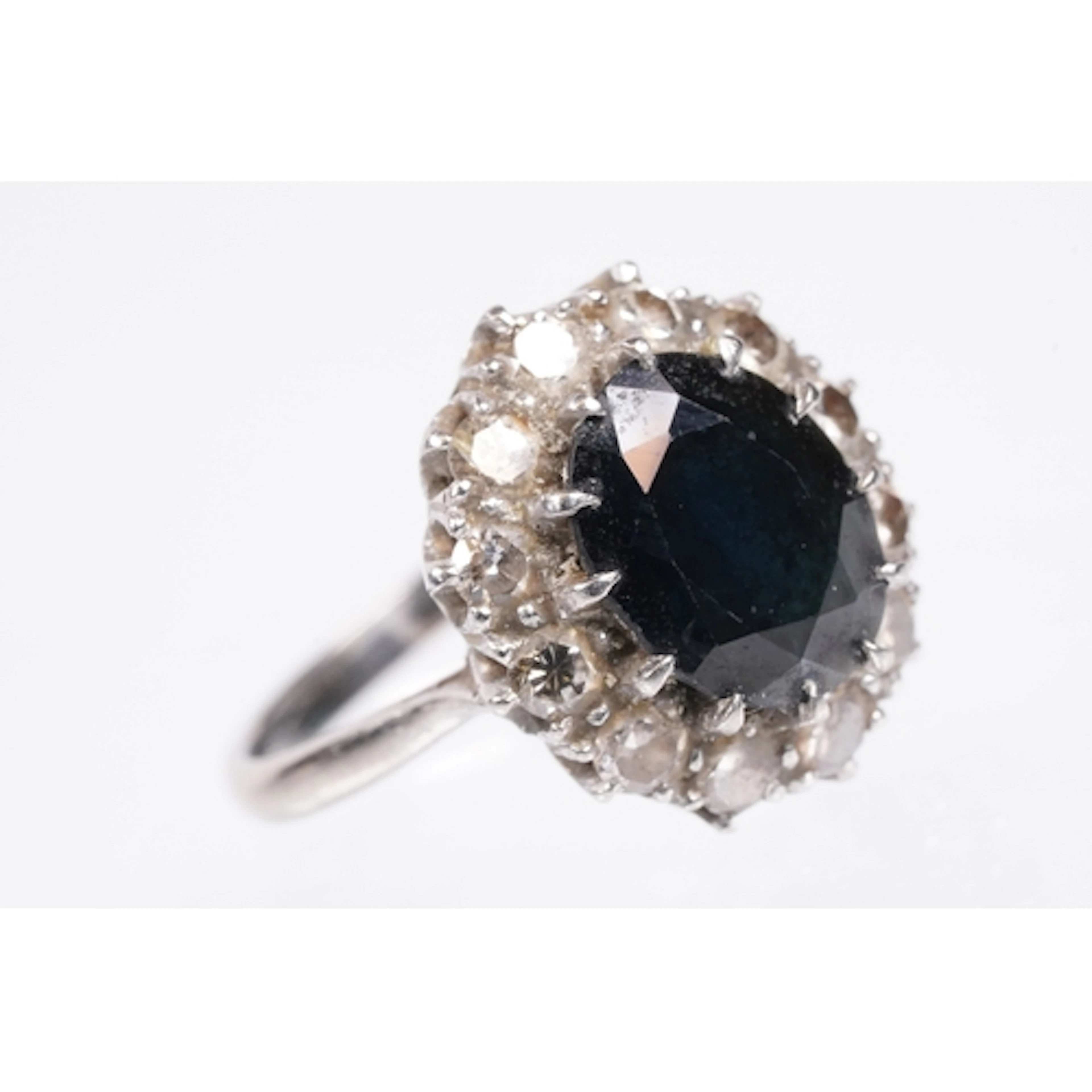 18ct white gold and platinum sapphire and diamond ring. The ...