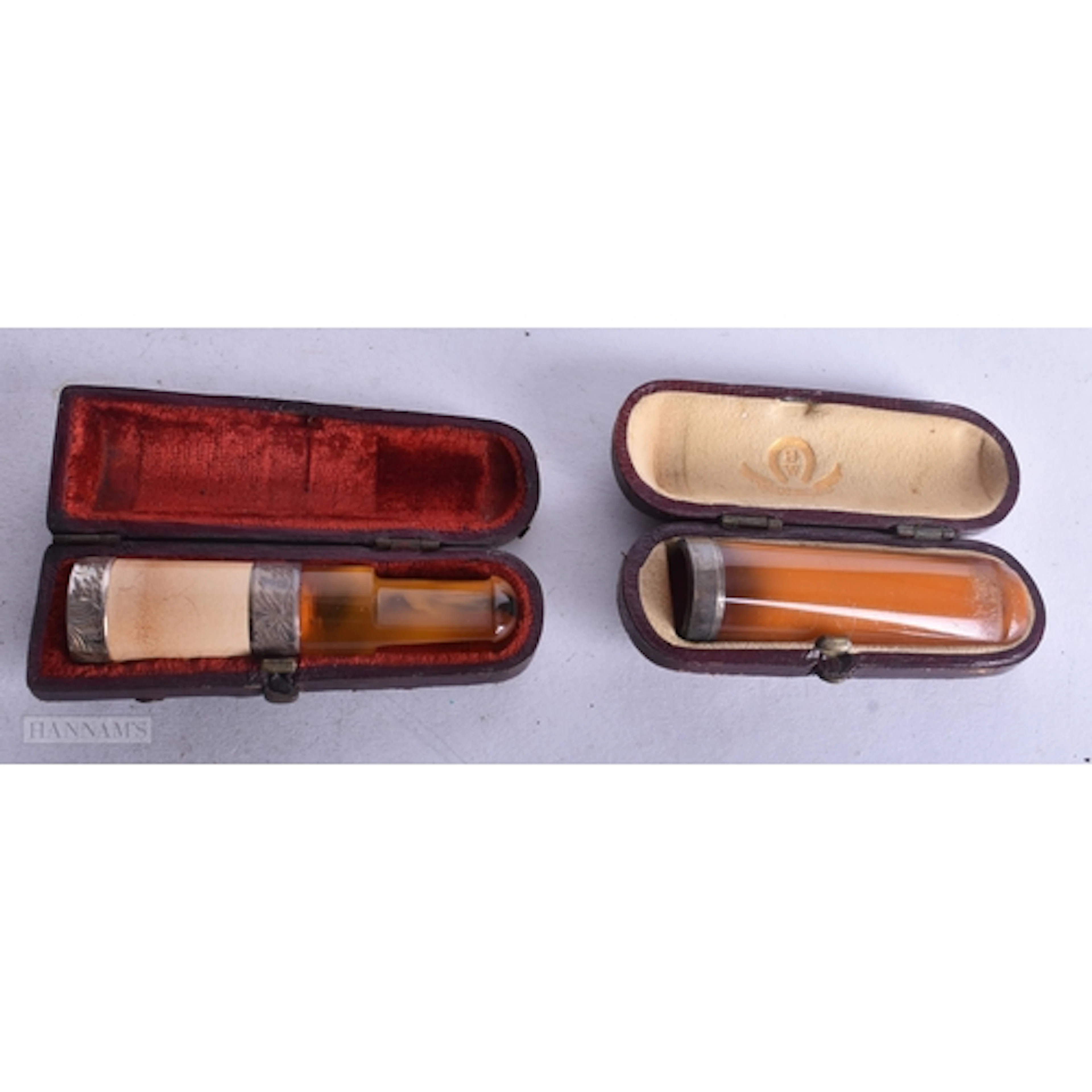TWO ANTIQUE SILVER MOUNTED CHEROOTS. (2)