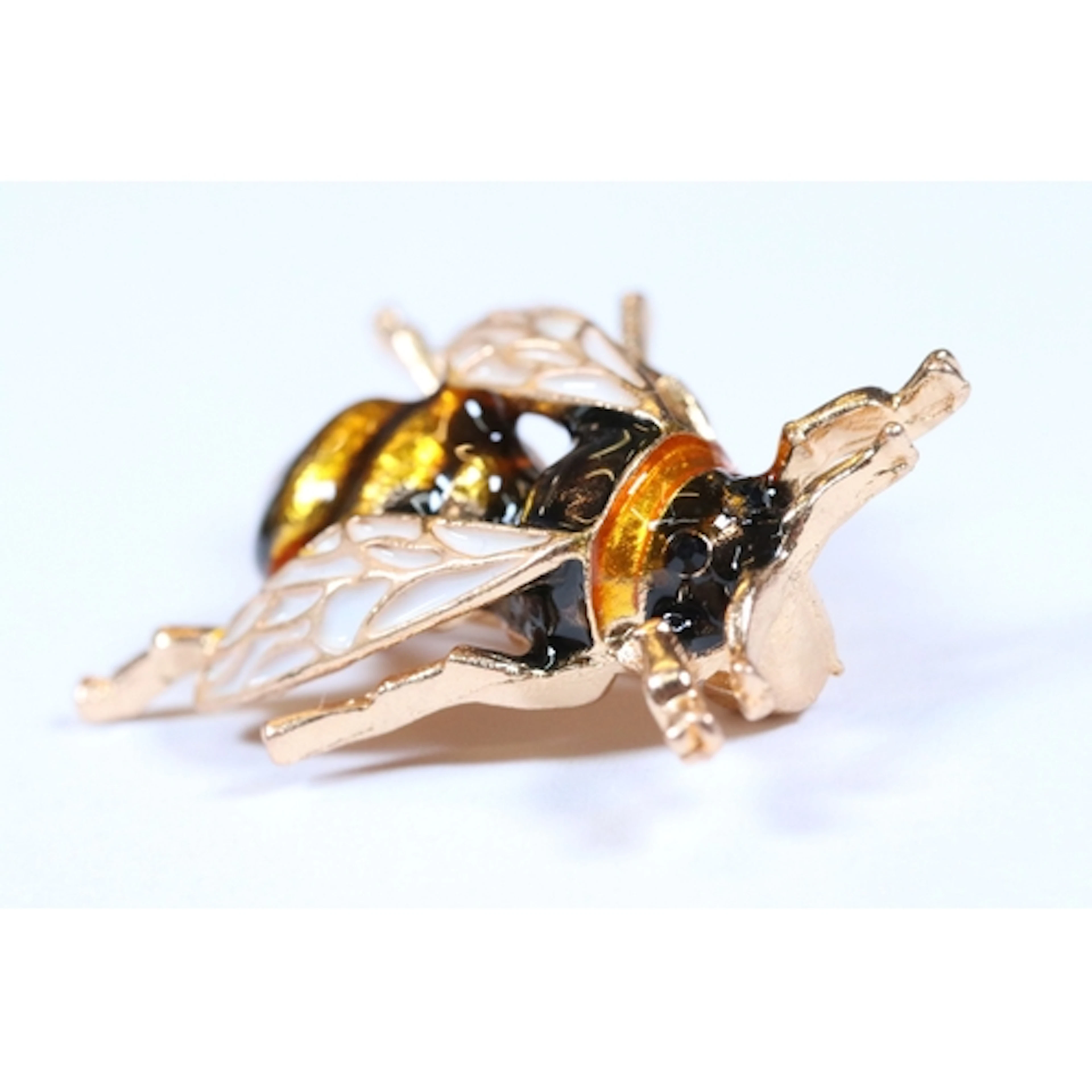 A contemporary gold tone enamel Bee / Bug brooch, measures a...