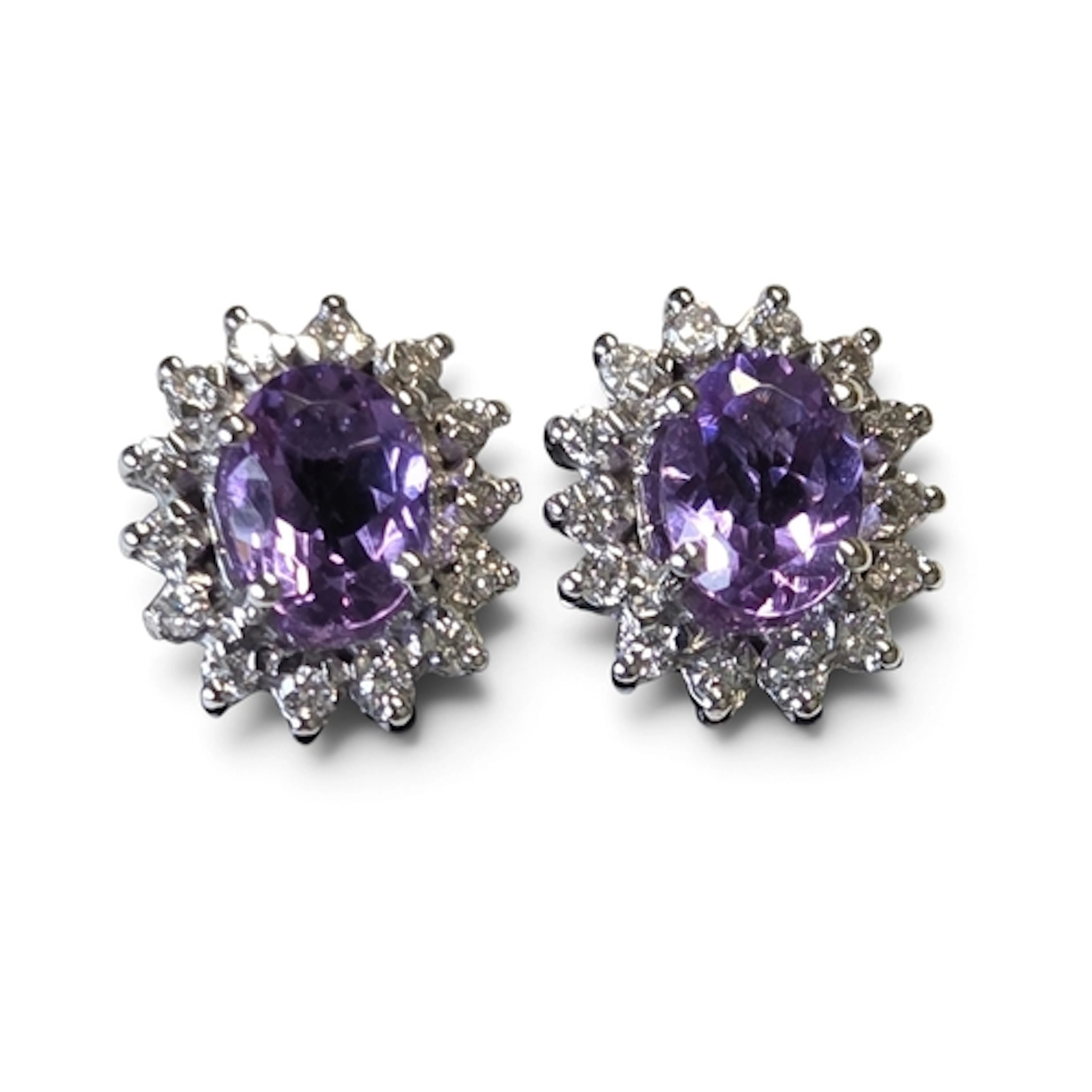 A fabulous pair of 18ct Gold, Diamond and Pink Sapphire clus...