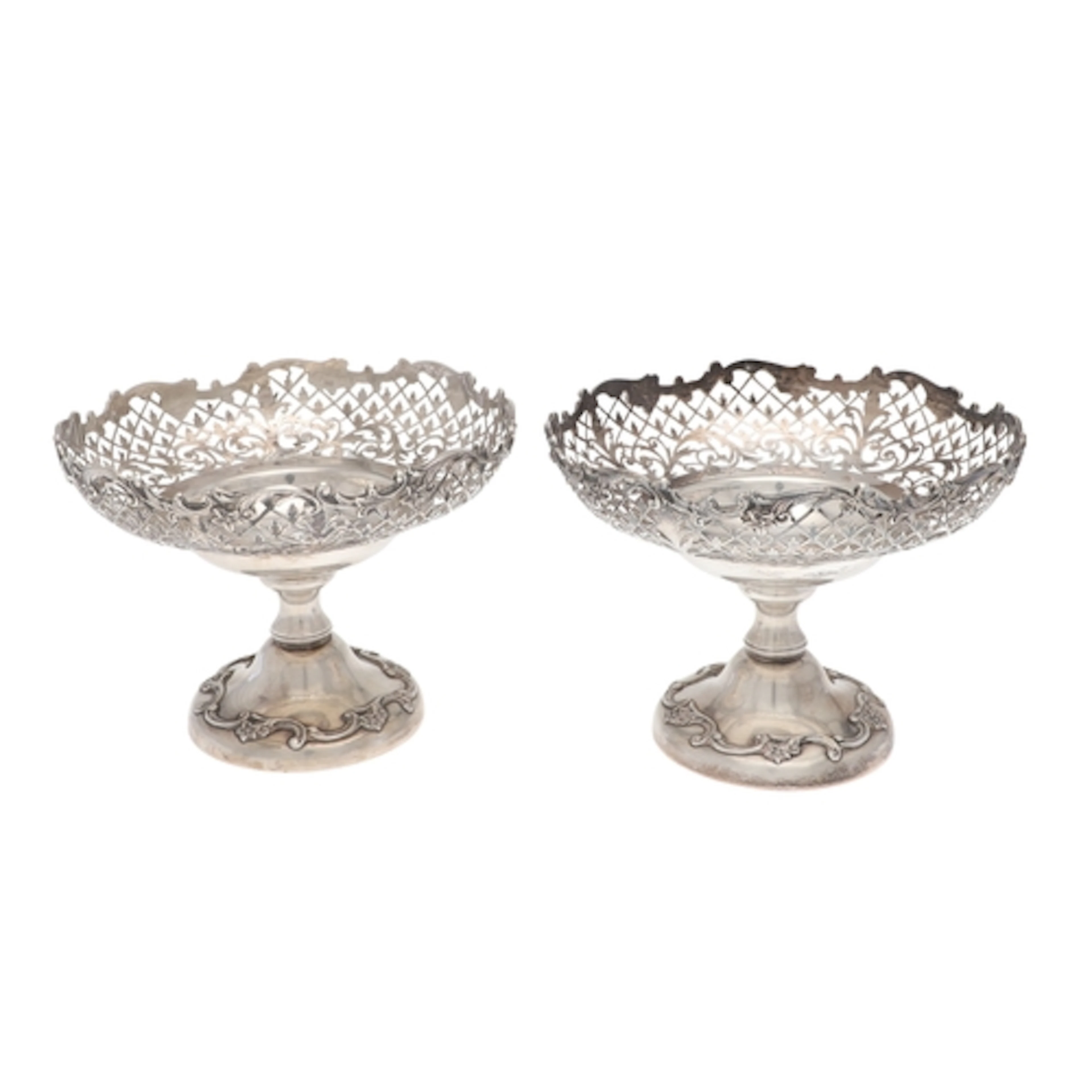 A PAIR OF EARLY 20TH CENTURY SILVER TAZZAS. Featuring pierce...
