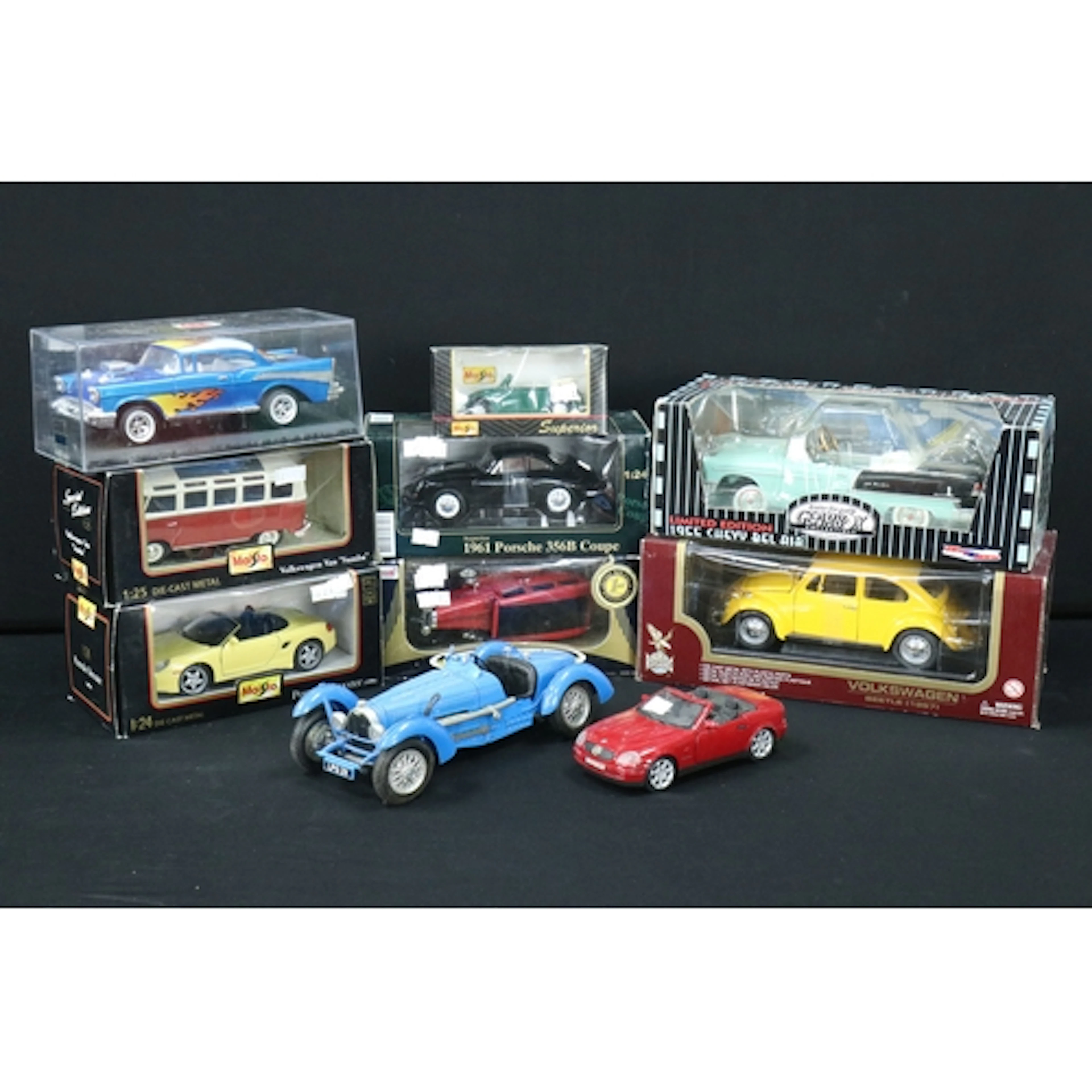 Eight boxed diecast models to include 1/18 Road Legends Volk...