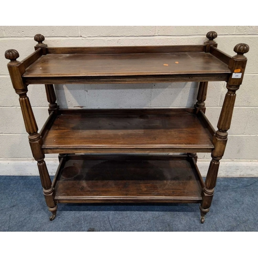 AN EARLY 20TH CENTURY MAHOGANY THREE-TIER BUFFET, reeded sup...