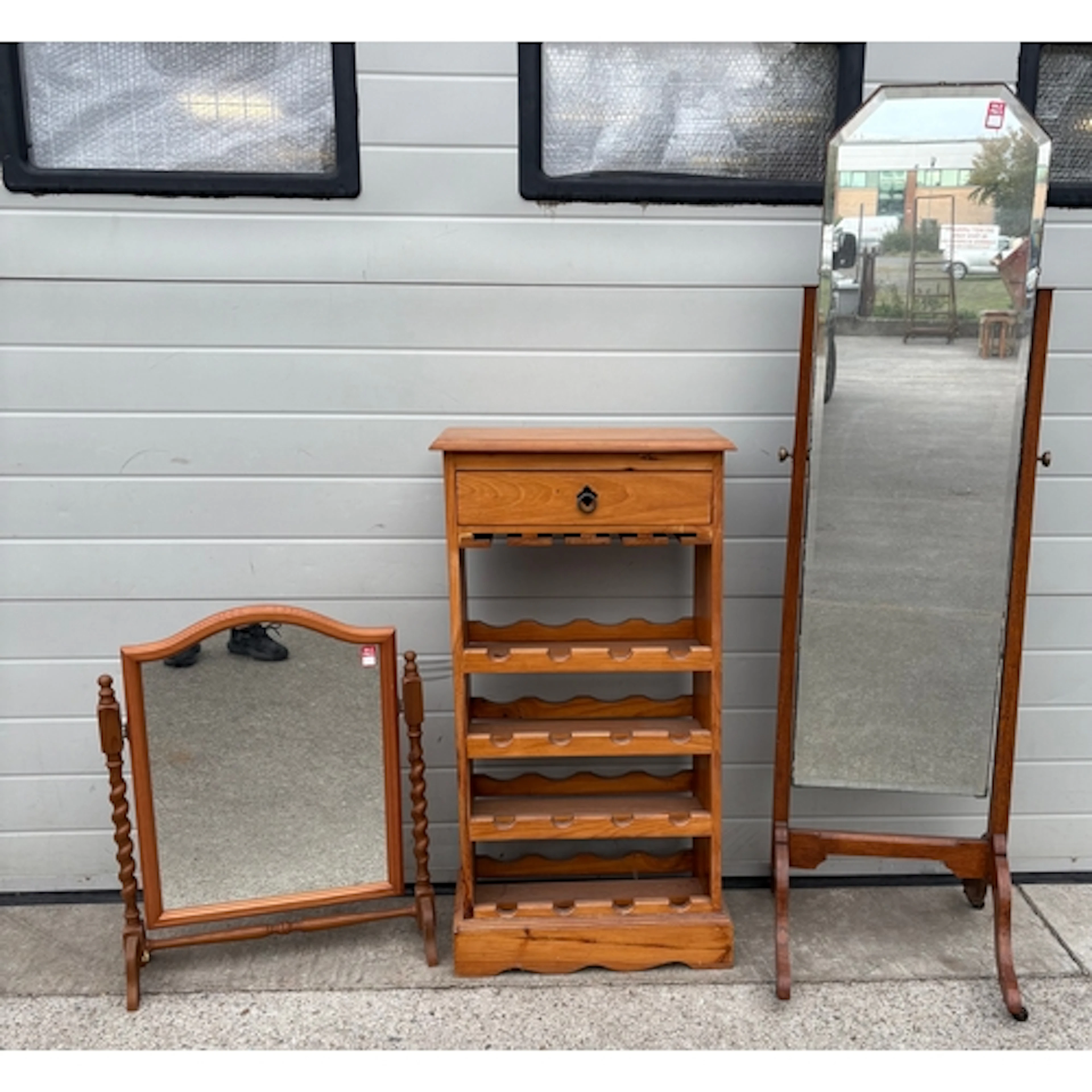 An oak framed cheval mirror, pine wine rack & a toilet mirro...