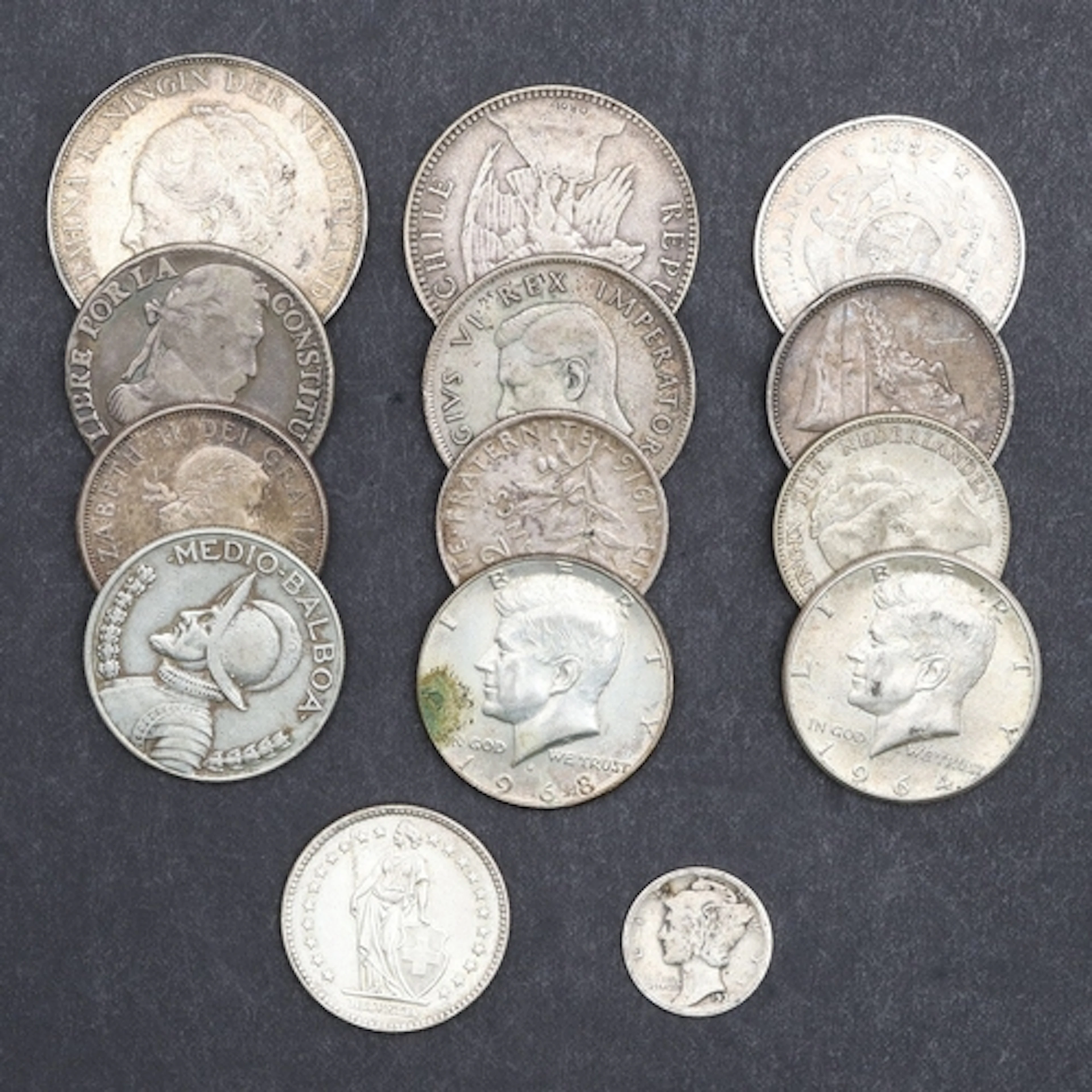 A COLLECTION OF MIXED WORLD SILVER COINS TO INCLUDE CHILE, N...