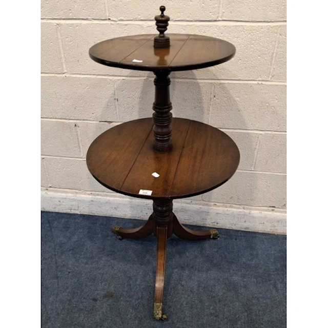 A 20TH CENTURY MAHOGANY TWO TIER DUMB-WAITER, each tier with...