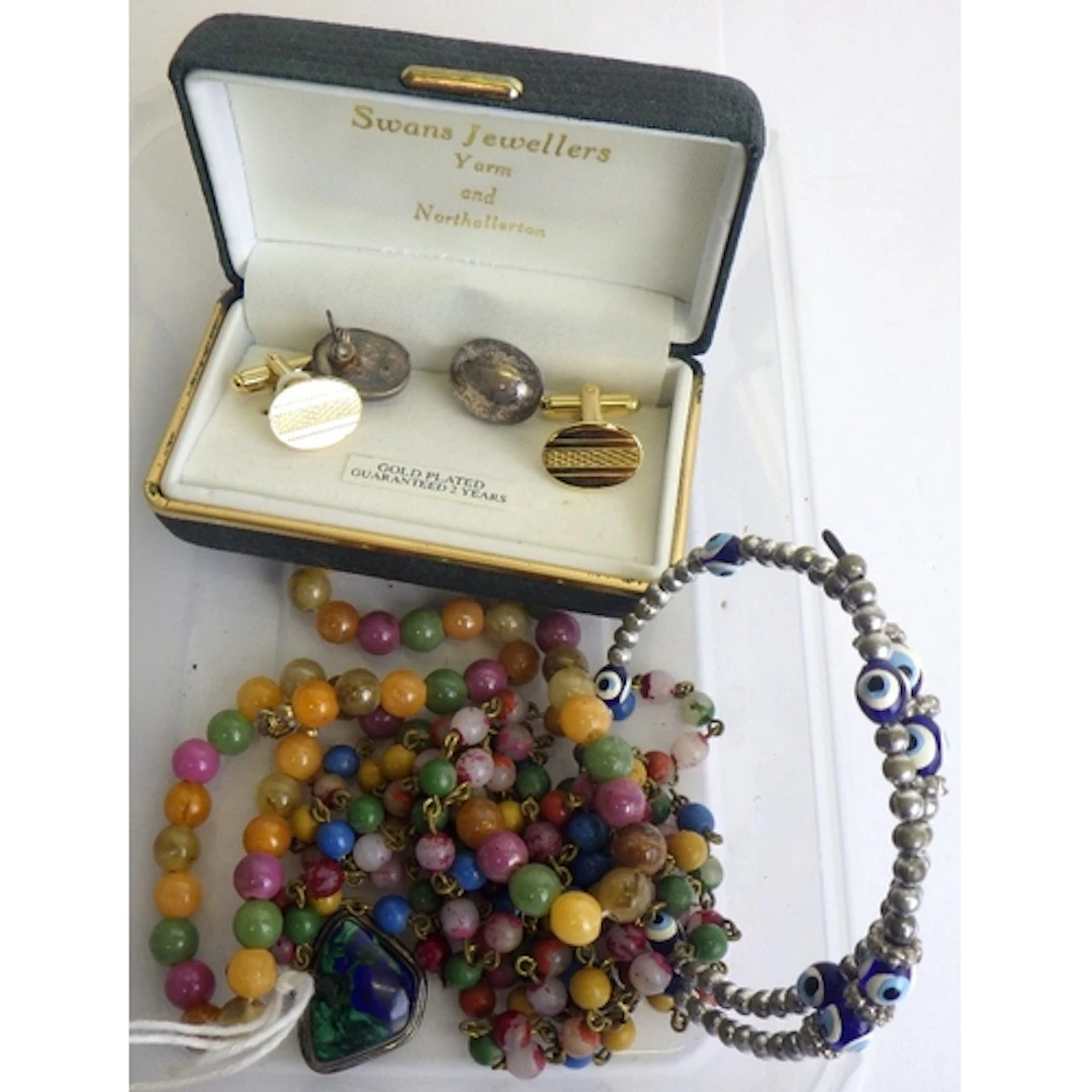 A qty of costume jewellery to inc silver mount pendant