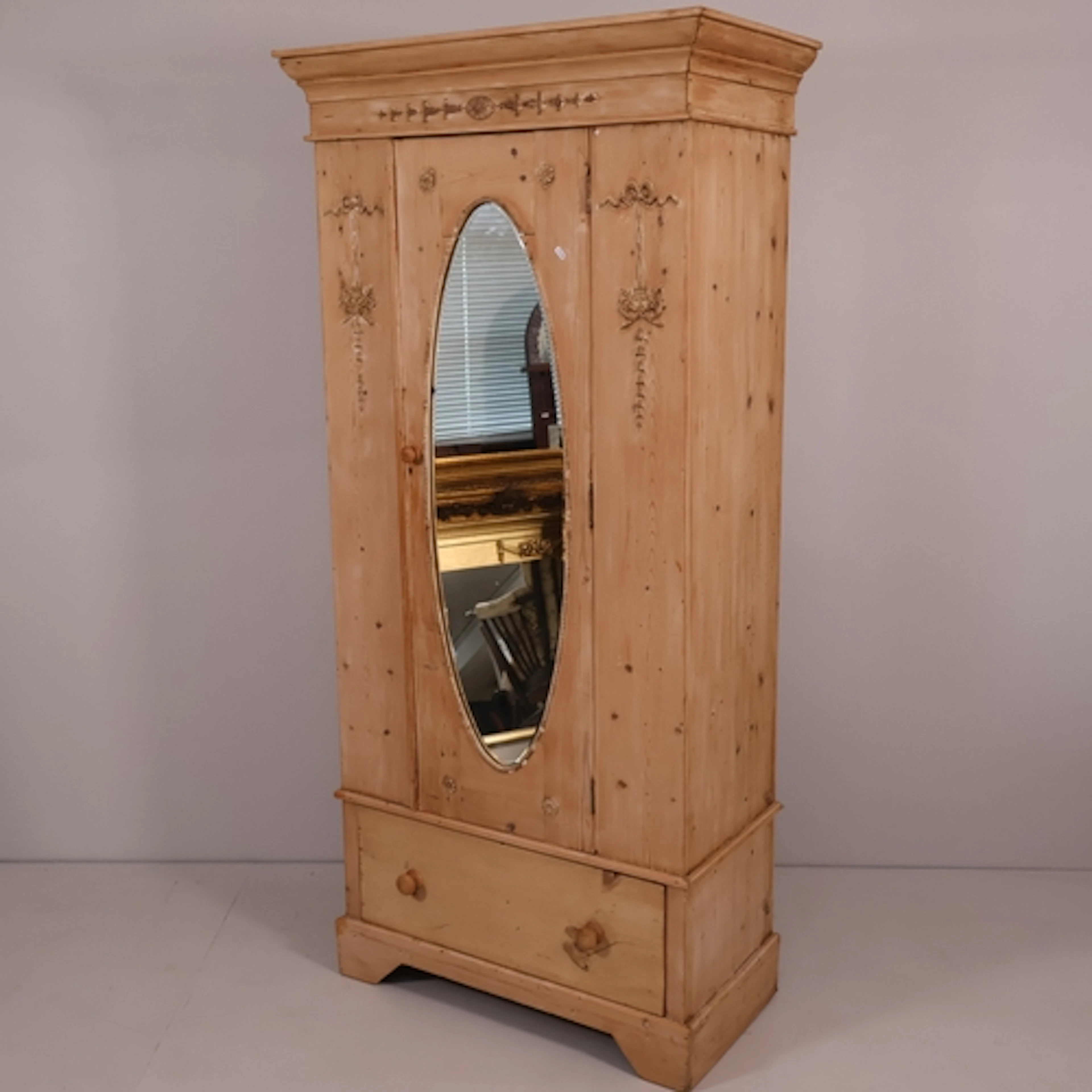 A French pine wardrobe, with single mirrored door, rail fitt...