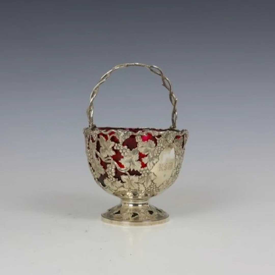 A Victorian silver swing handled basket, George Angell & Co,...