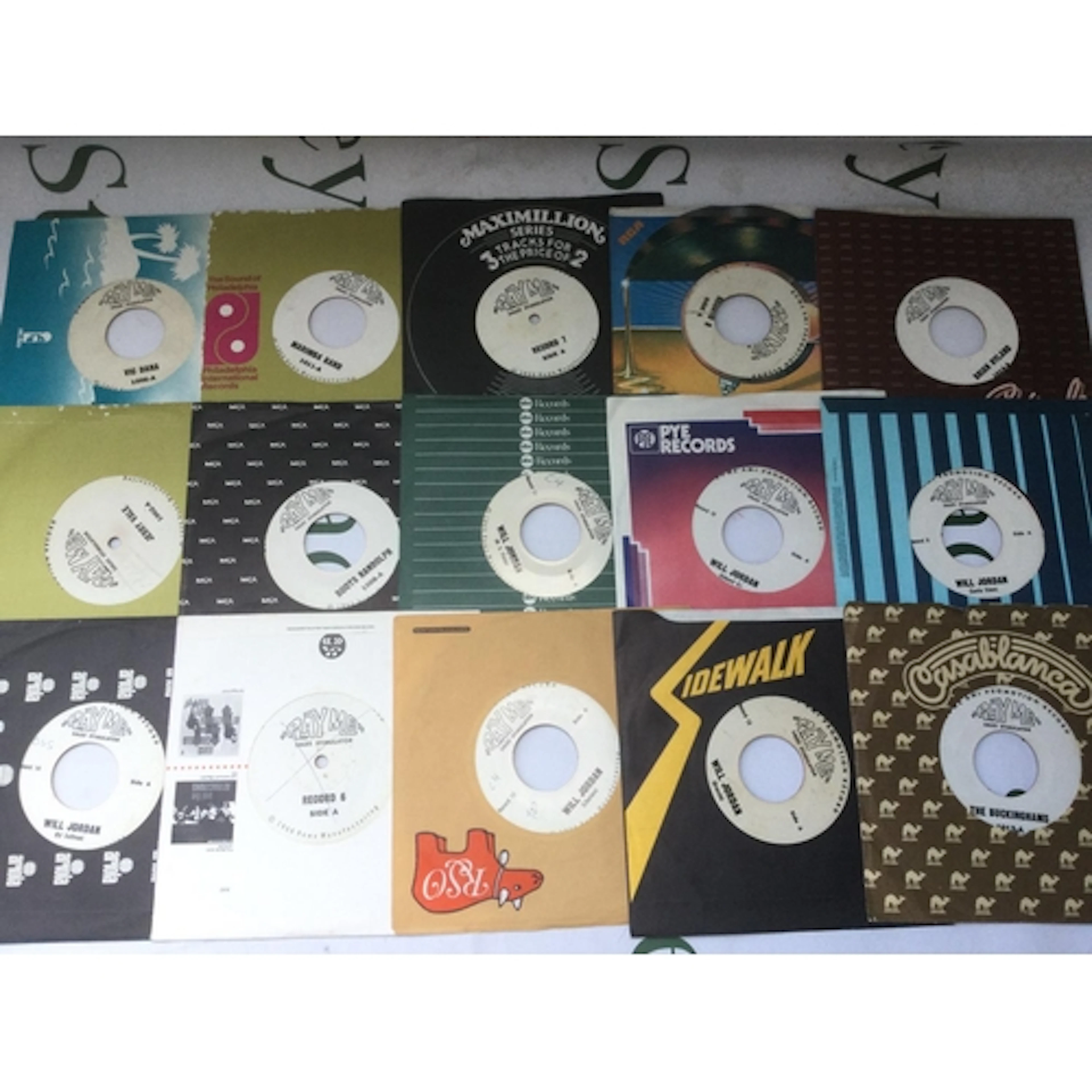 15 red vinyl Play Me Sales Stimulator 7" records. These were...
