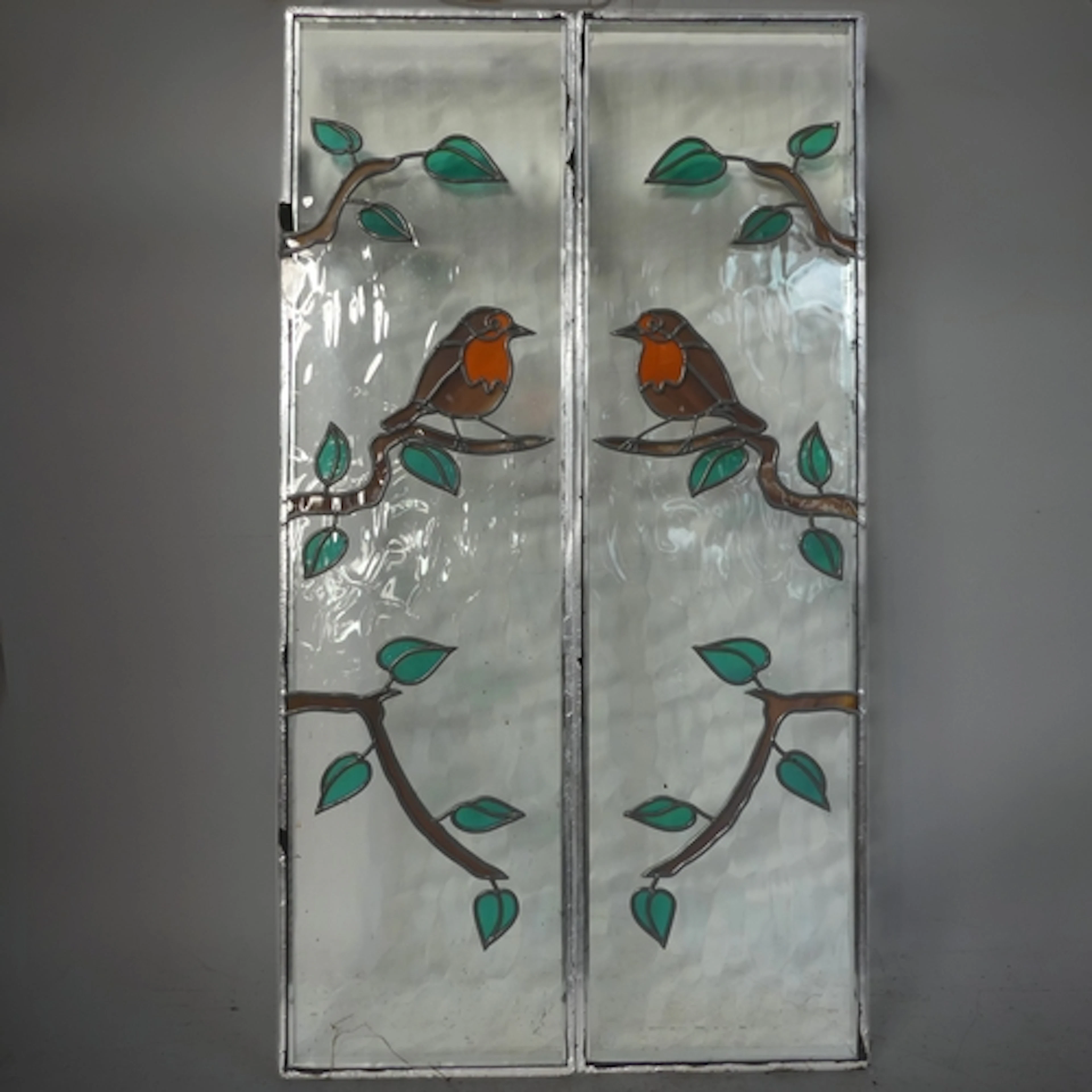 A pair of vintage Art Nouveau style stained and leaded rippl...