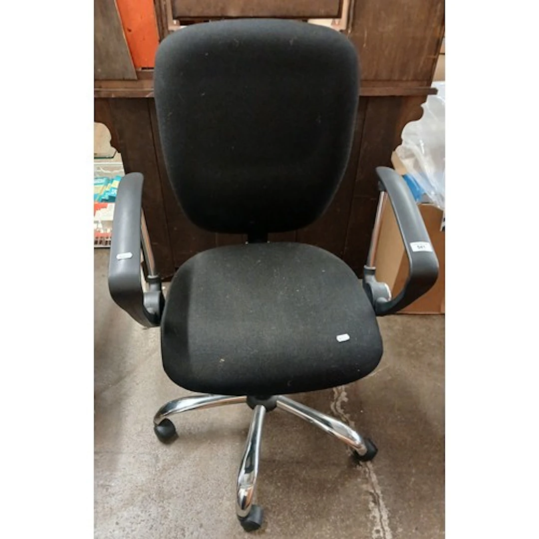 Black upholstered office armchair.