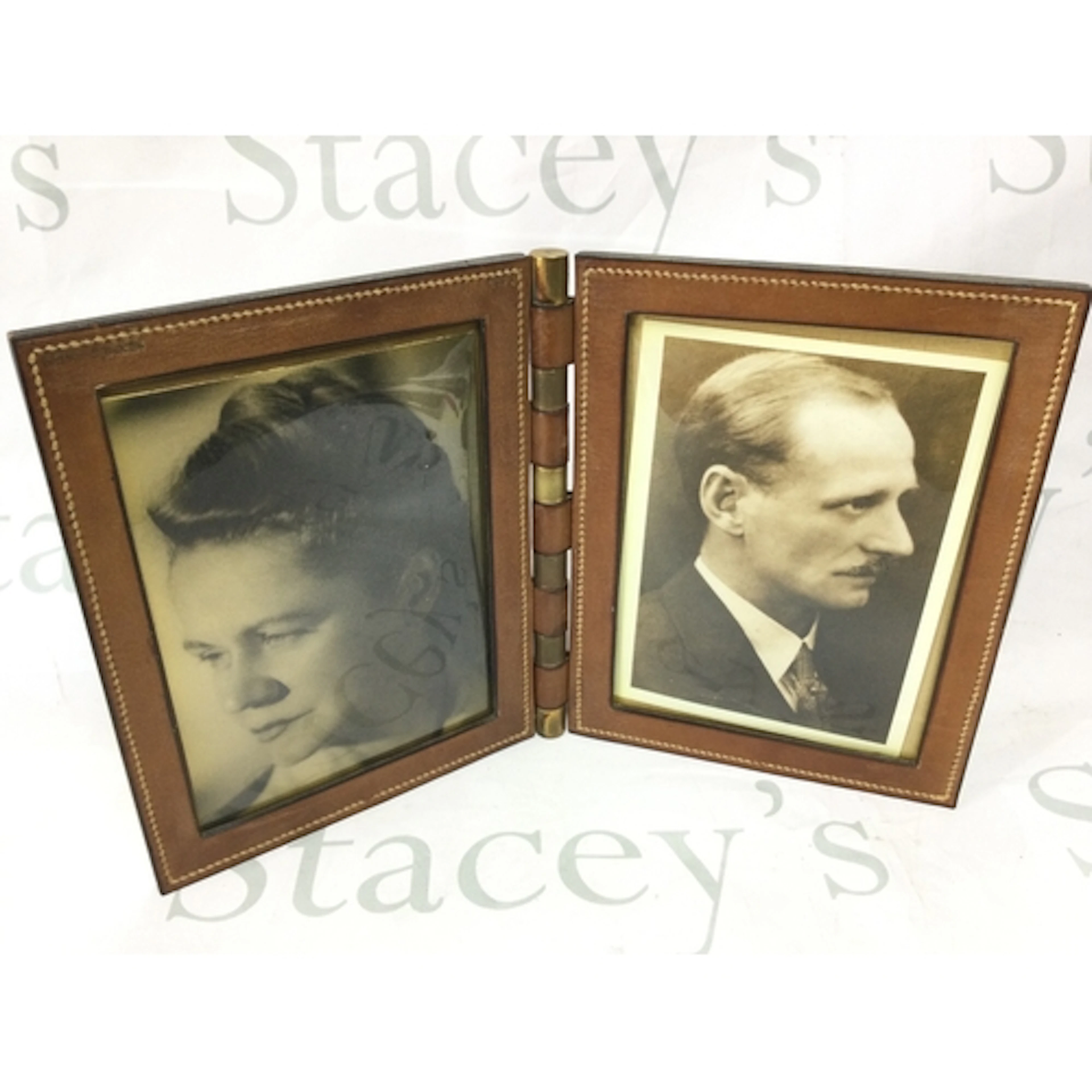 A vintage Hermes double folding leather travel picture frame...
