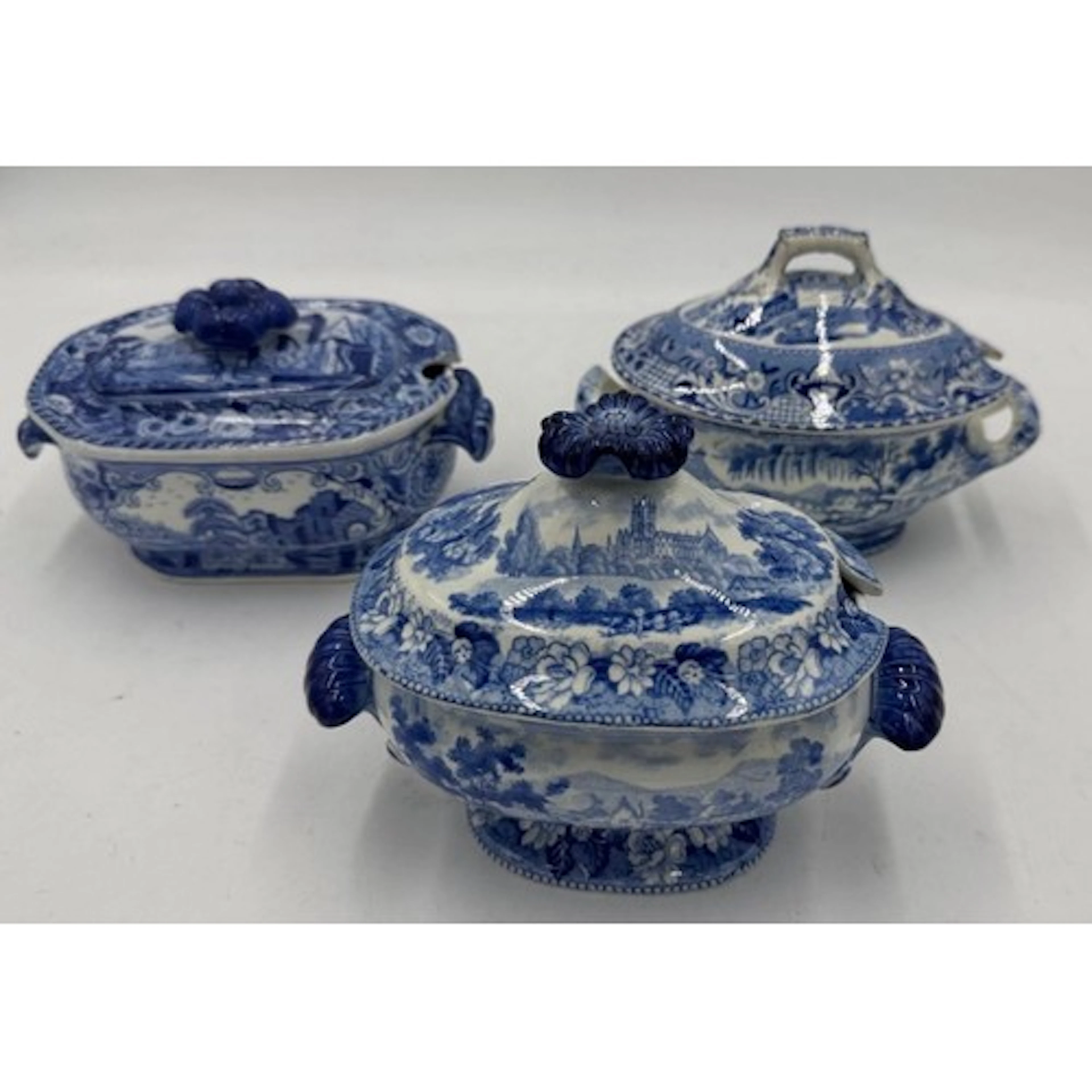 Three early 19th century blue and white transfer-printed sau...