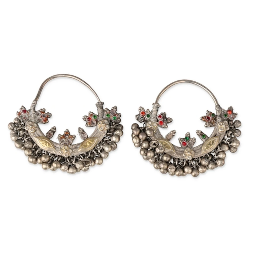 A PAIR OF INDIAN SILVER EARRINGS, 19TH CENTURY Formerly in t...