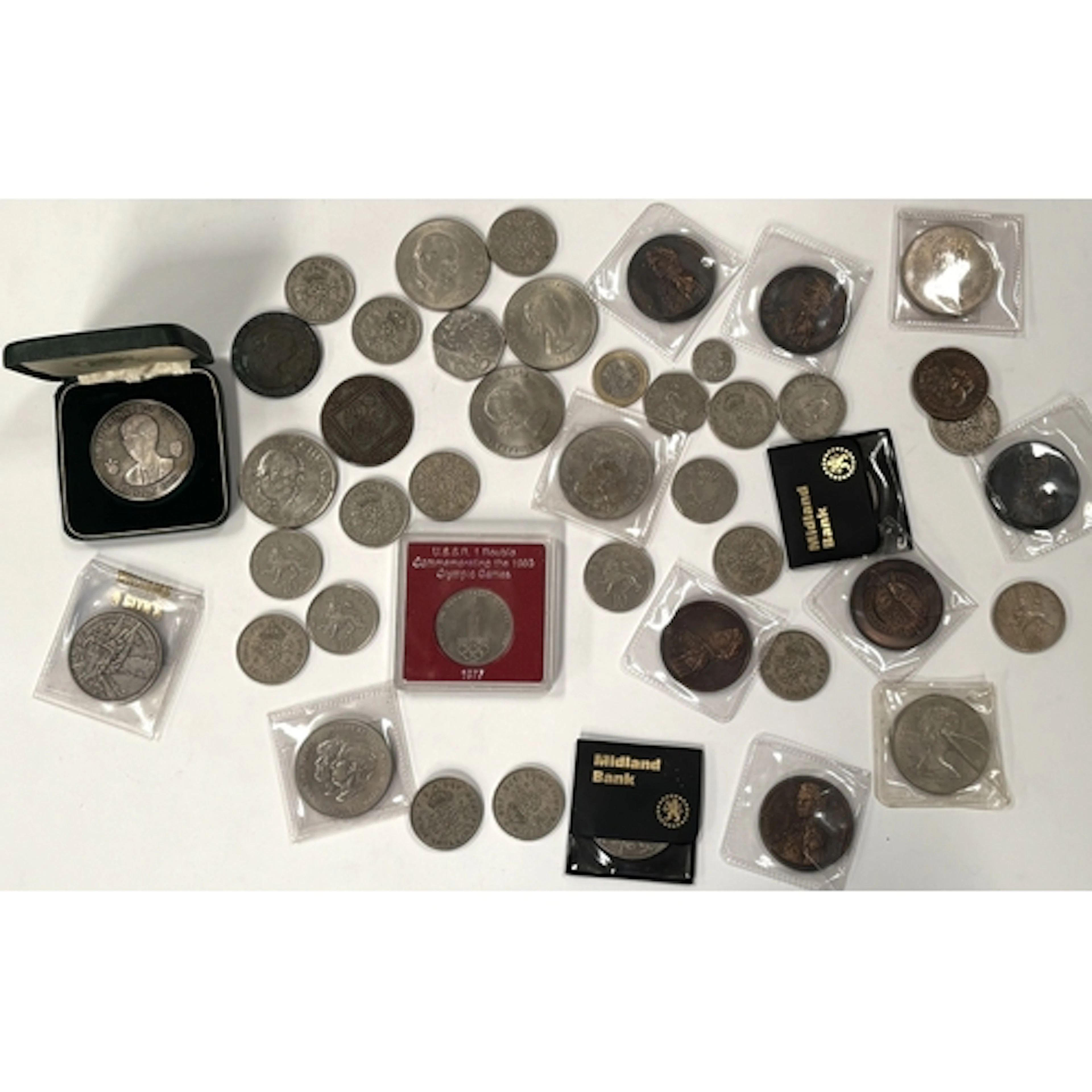 A mixed selection of GB and foreign coins including a Prince...
