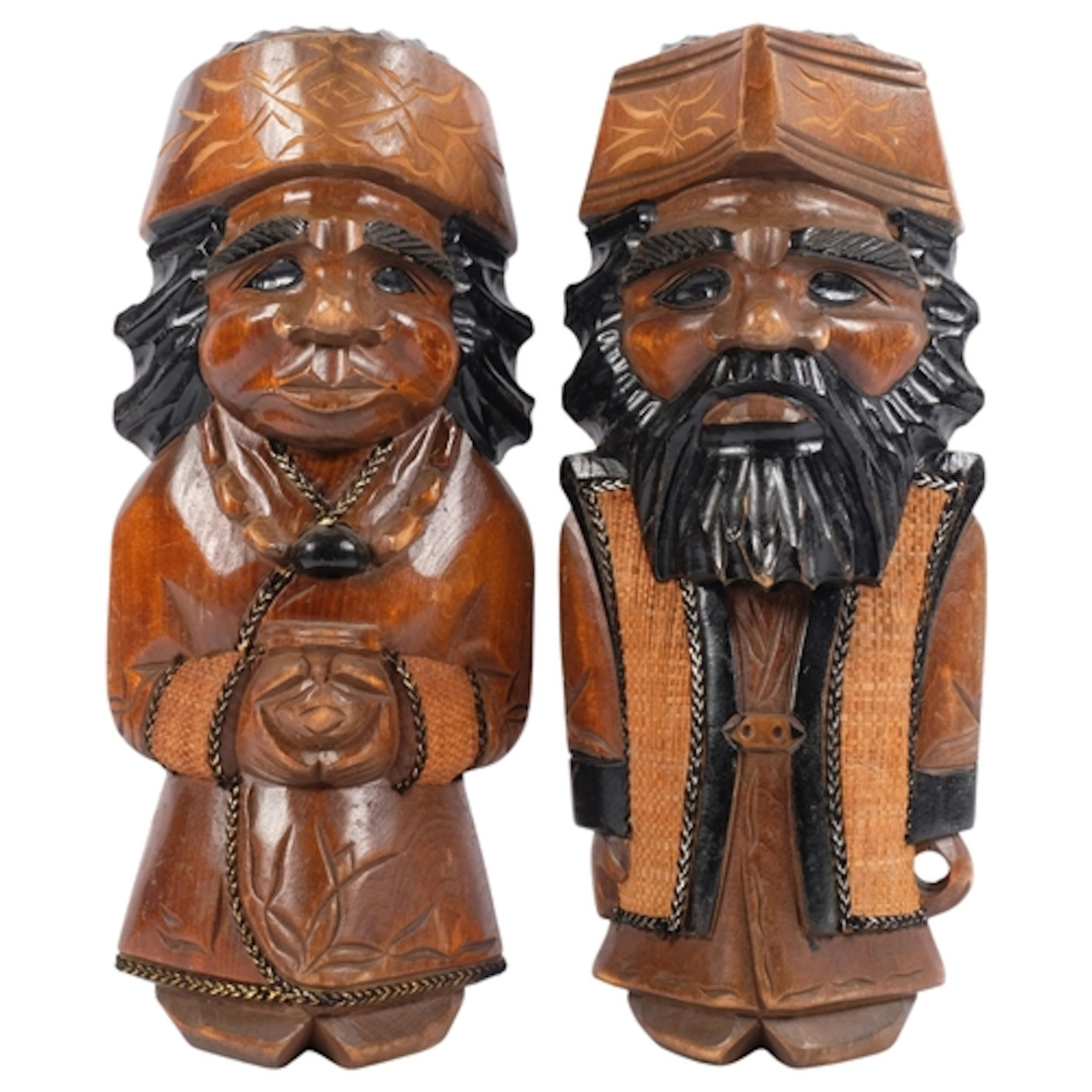 A pair of Vintage Japanese carved Ainu figures, male and fem...