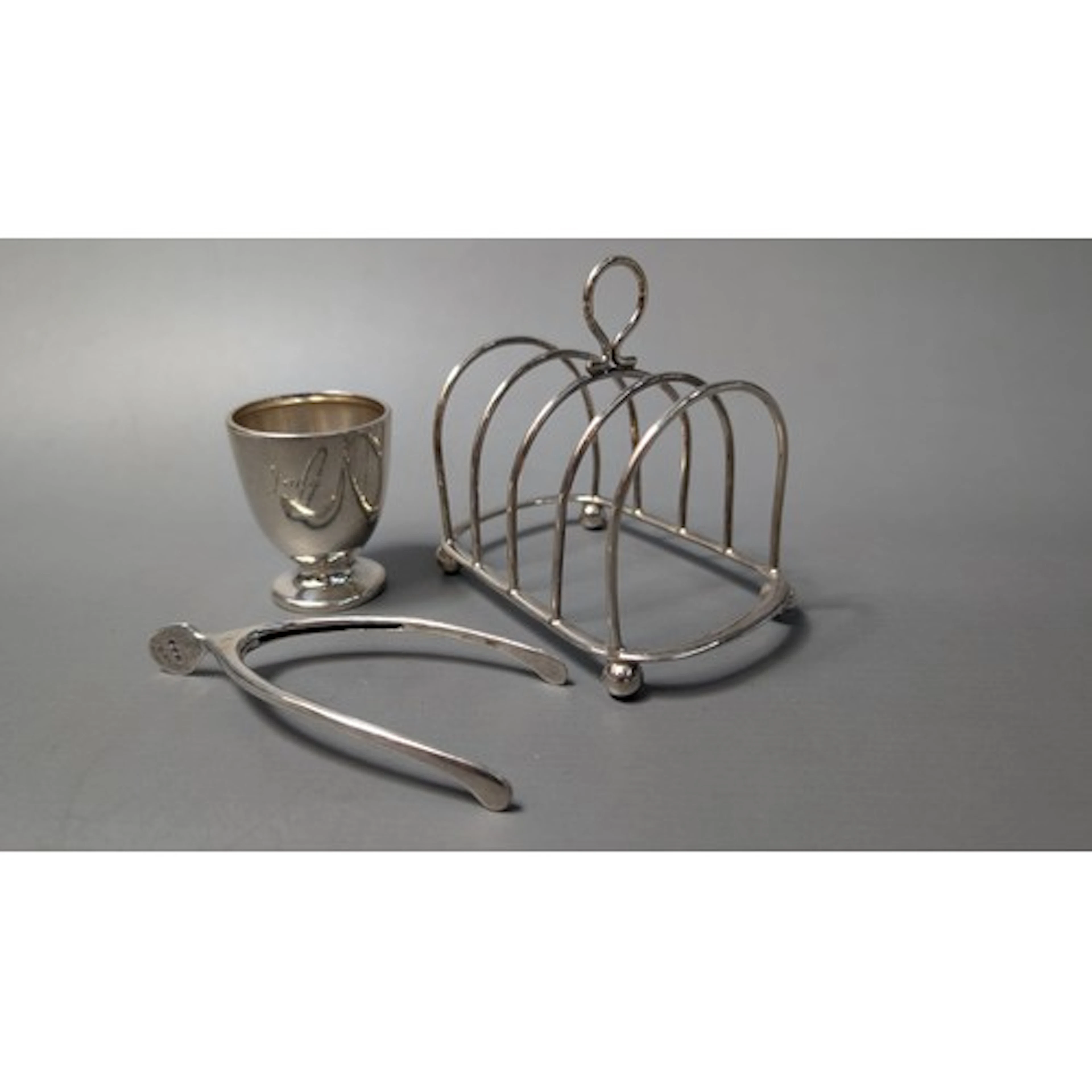 Three pieces of silverware, various makers and dates, compri...