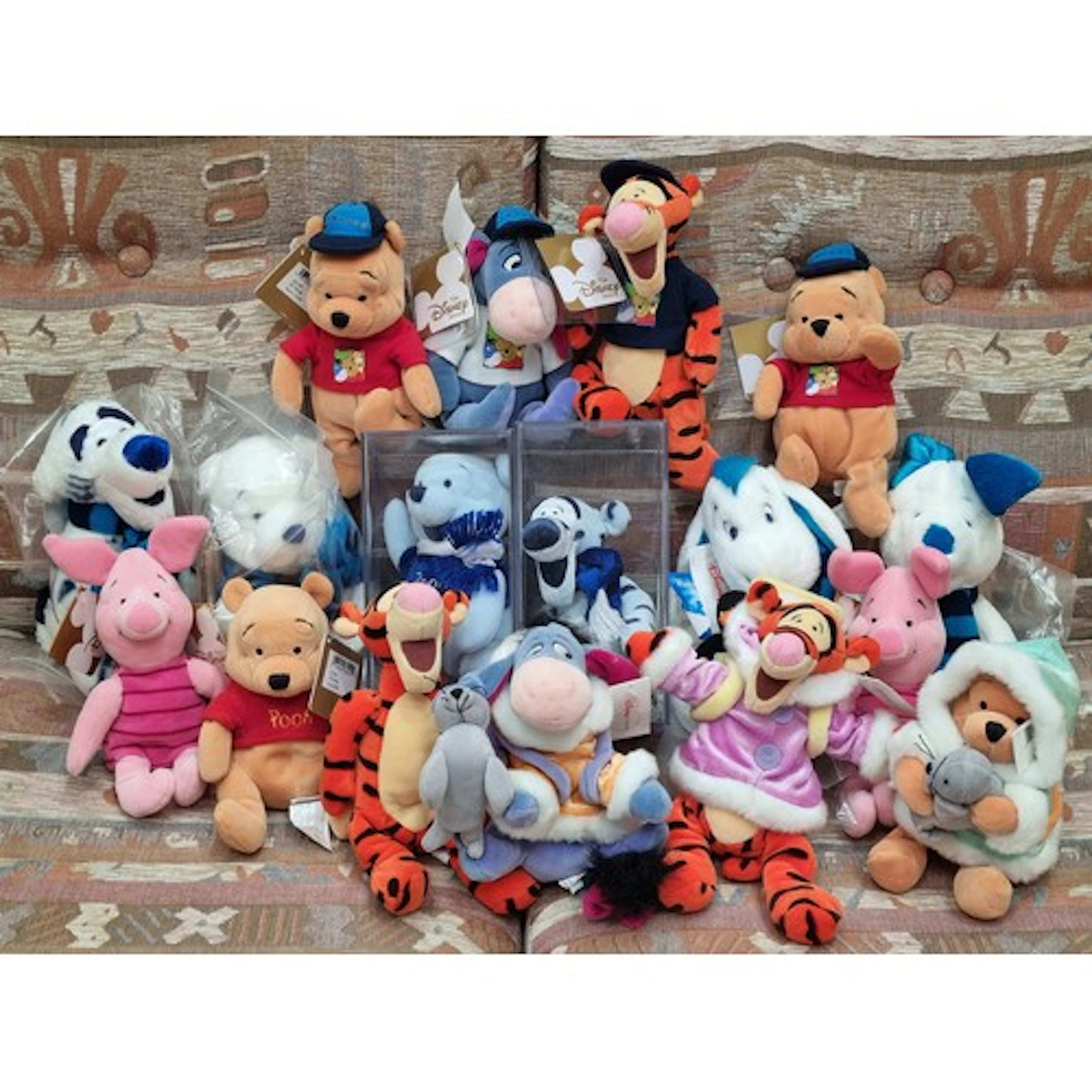 A collection of Disney soft toys, (*Please note the Steiff "...