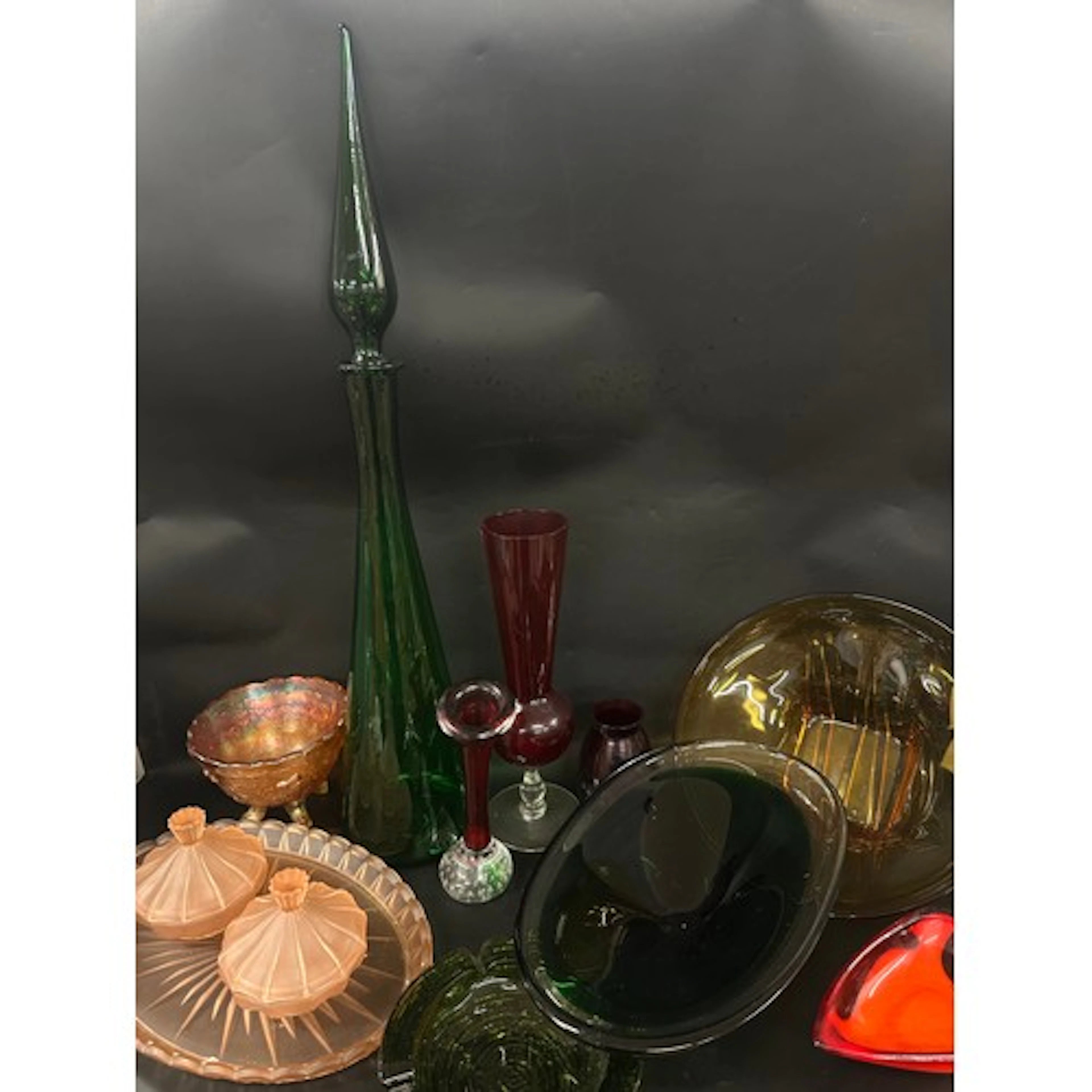 A collection of coloured glass to include mid century art gl...