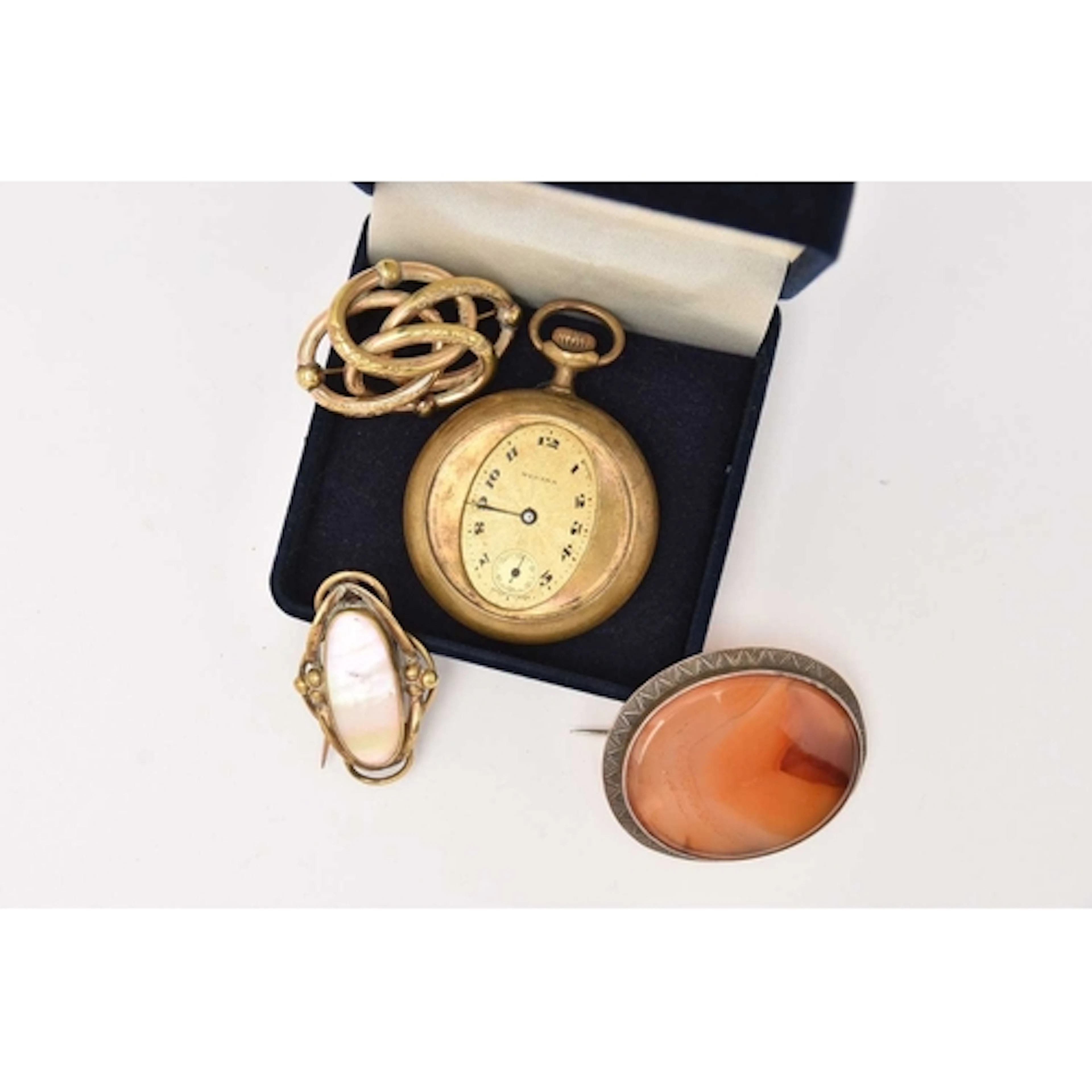 THREE BROOCHES AND A POCKET WATCH, to include a large white ...