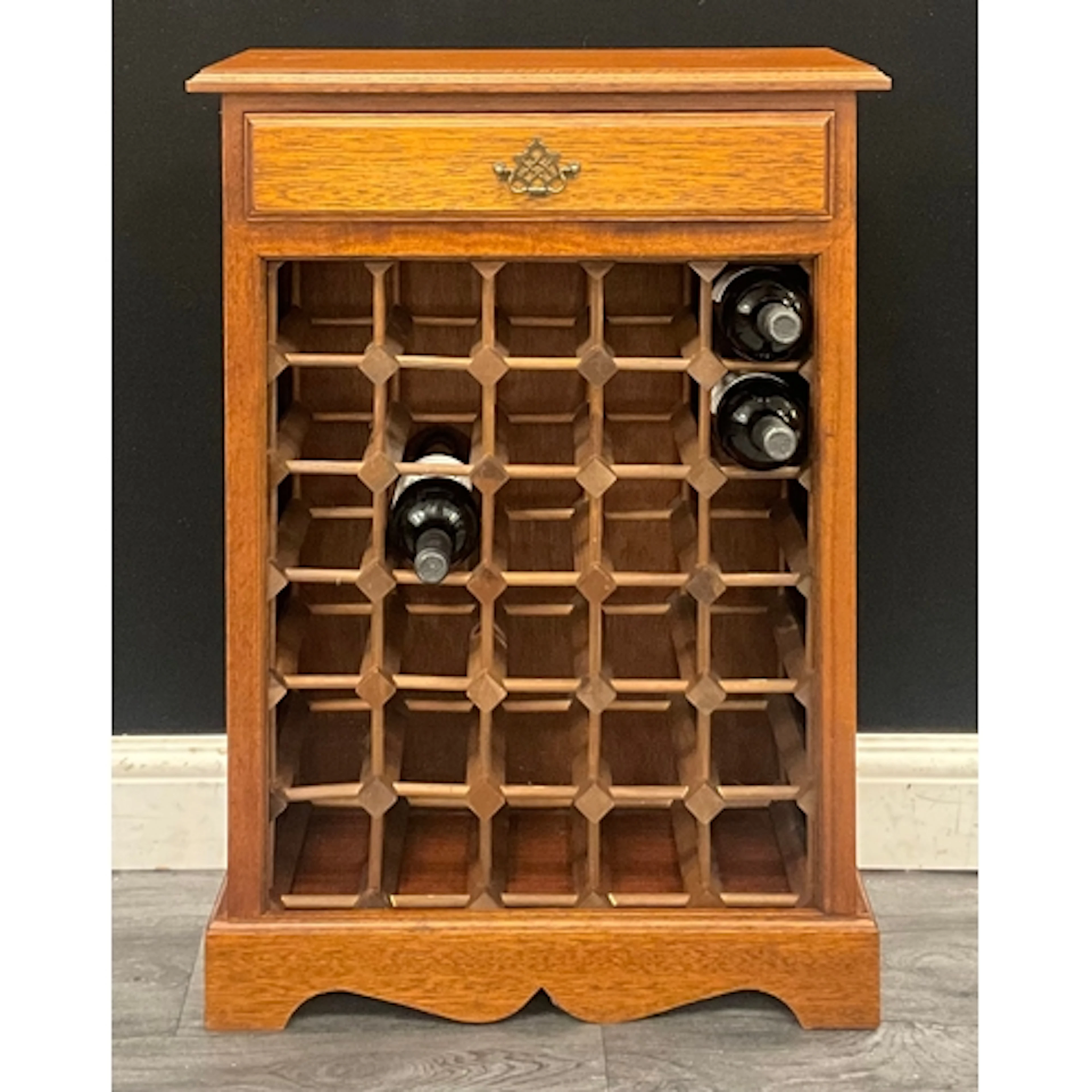 A late 20th century Mahogany thirty bottle wine rack, rectan...