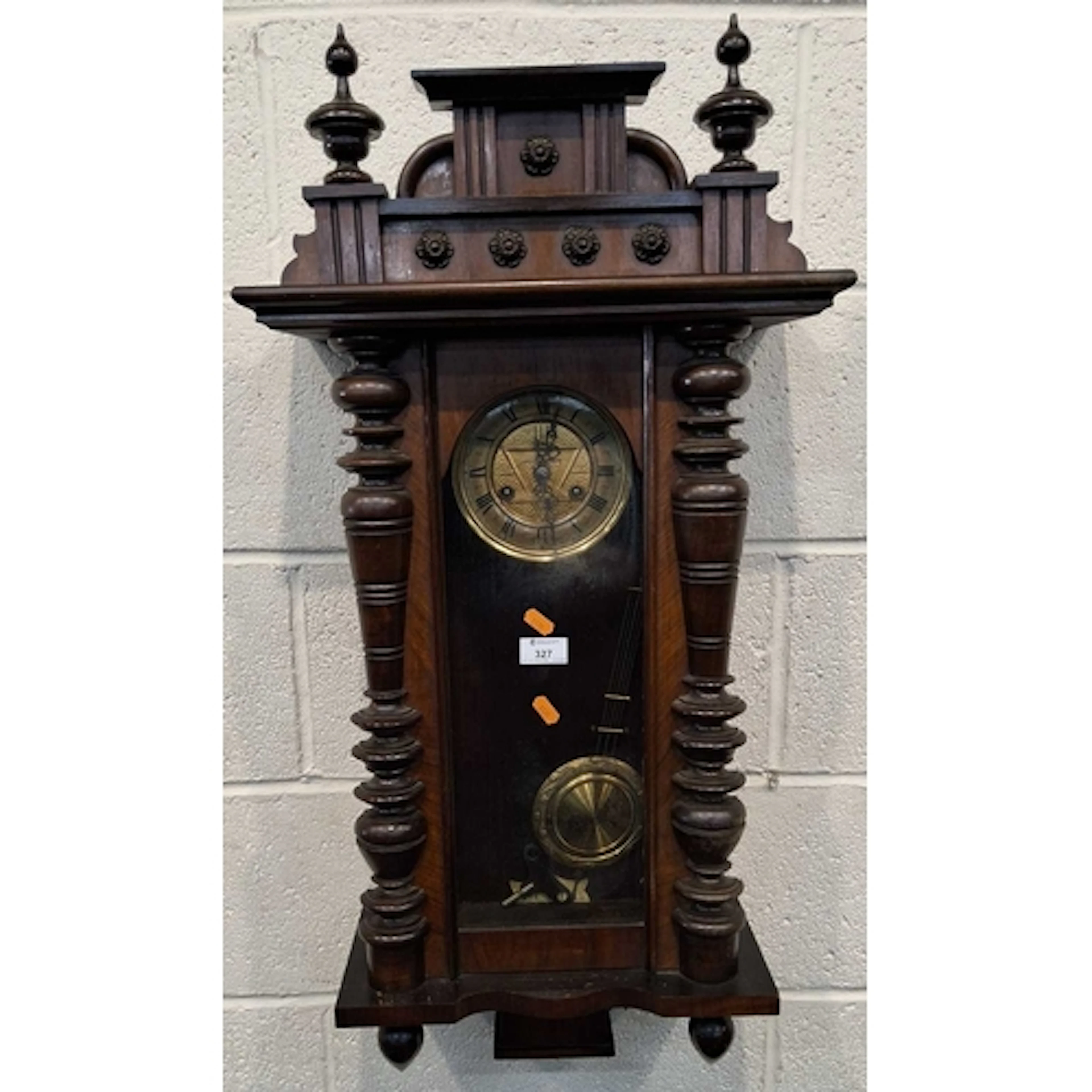 A 20TH CENTURY WALL CLOCK, with an arched glass door, thats ...