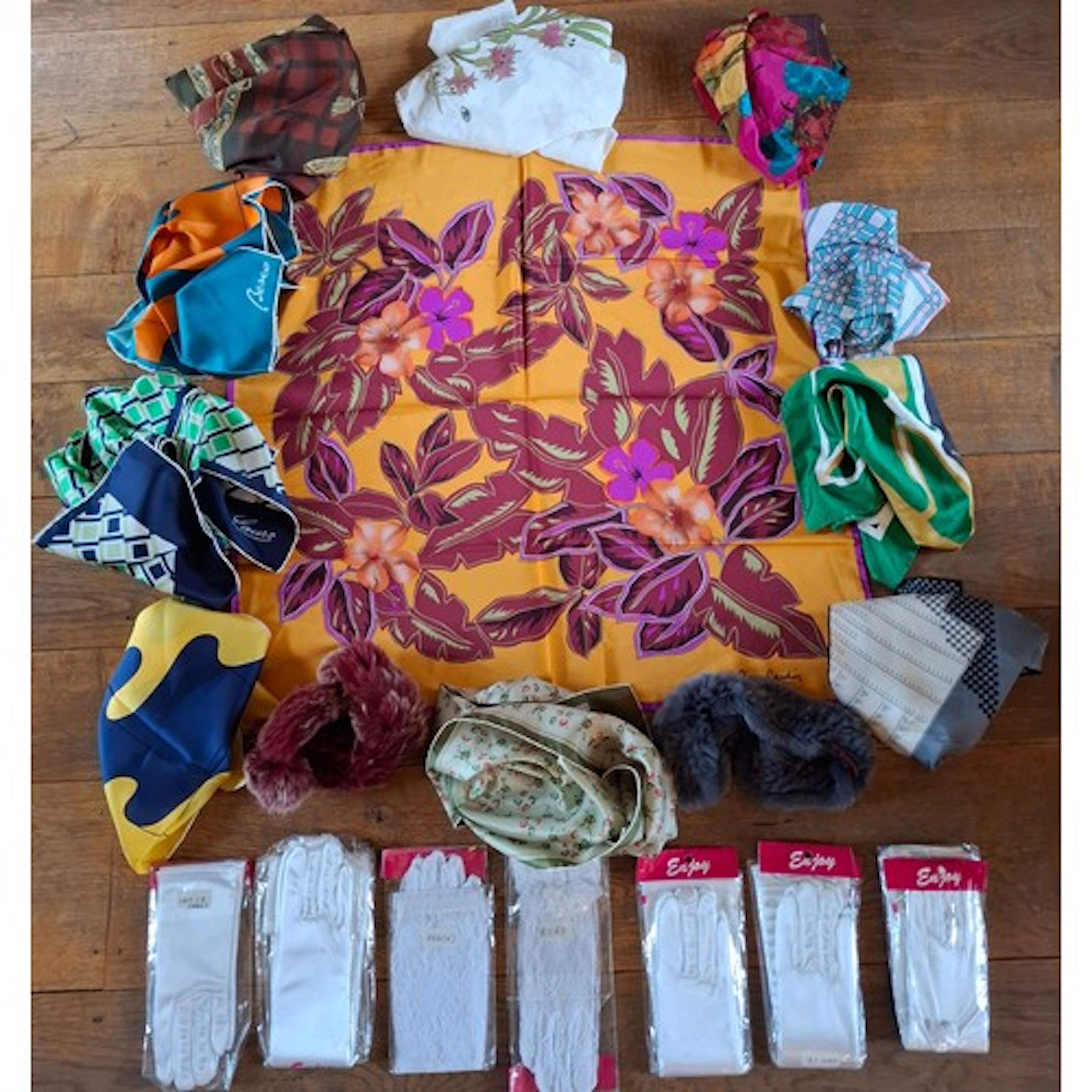 A group of scarves to include Cynthia Rowley, a white Luhal ...
