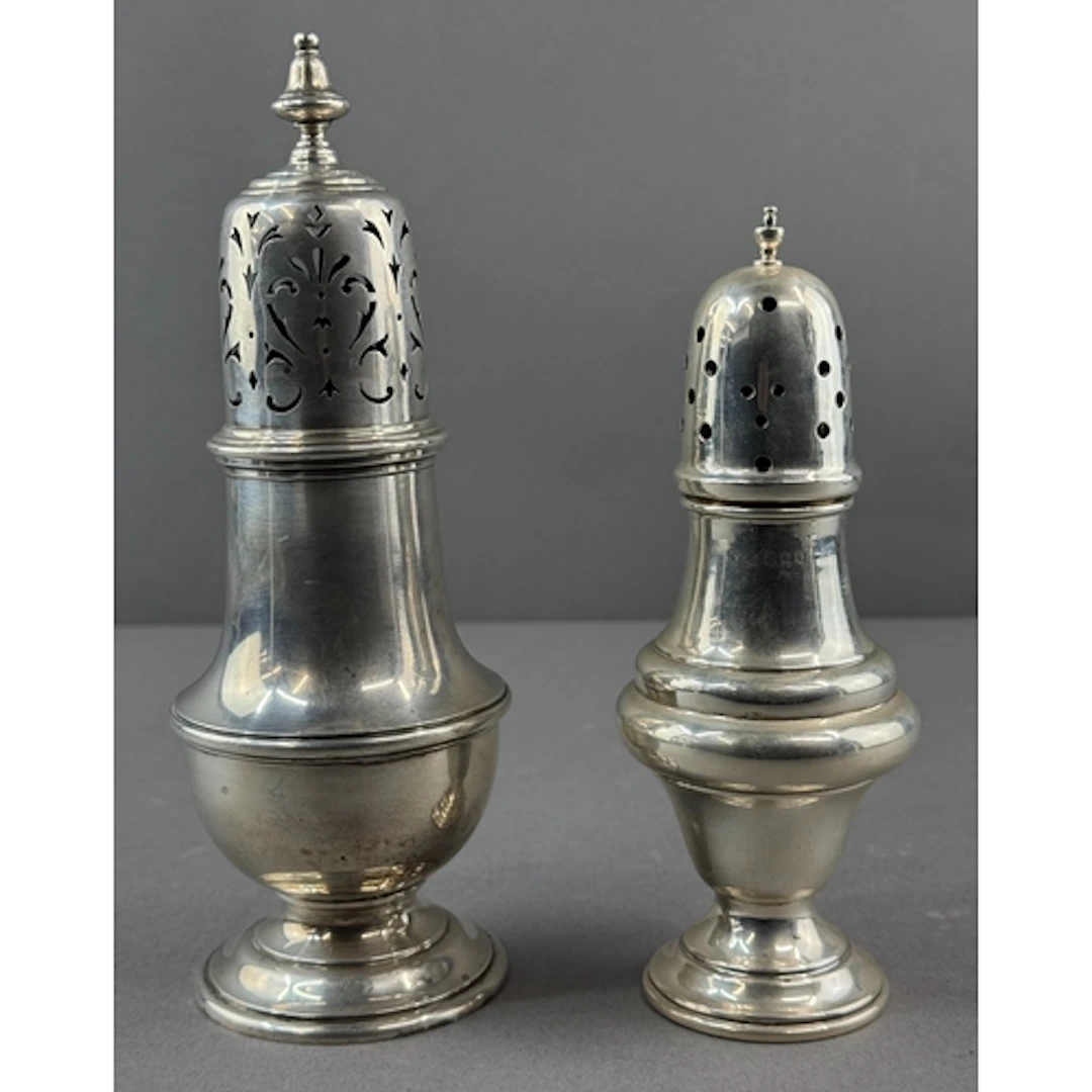 Silver: a baluster sugar caster by William Comyns, London 19...
