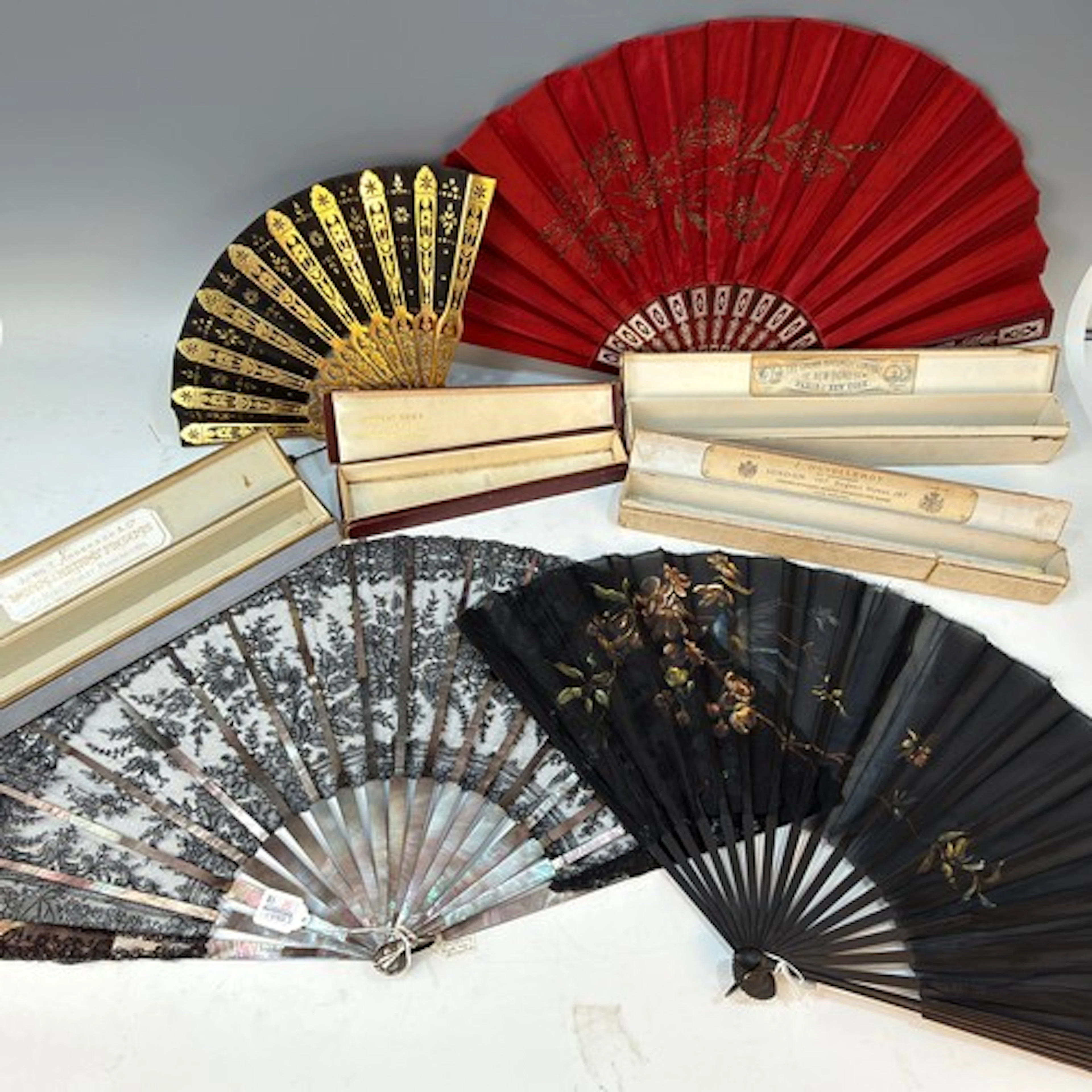A collection of Antique boxed Fans, to include an Ernest Kee...