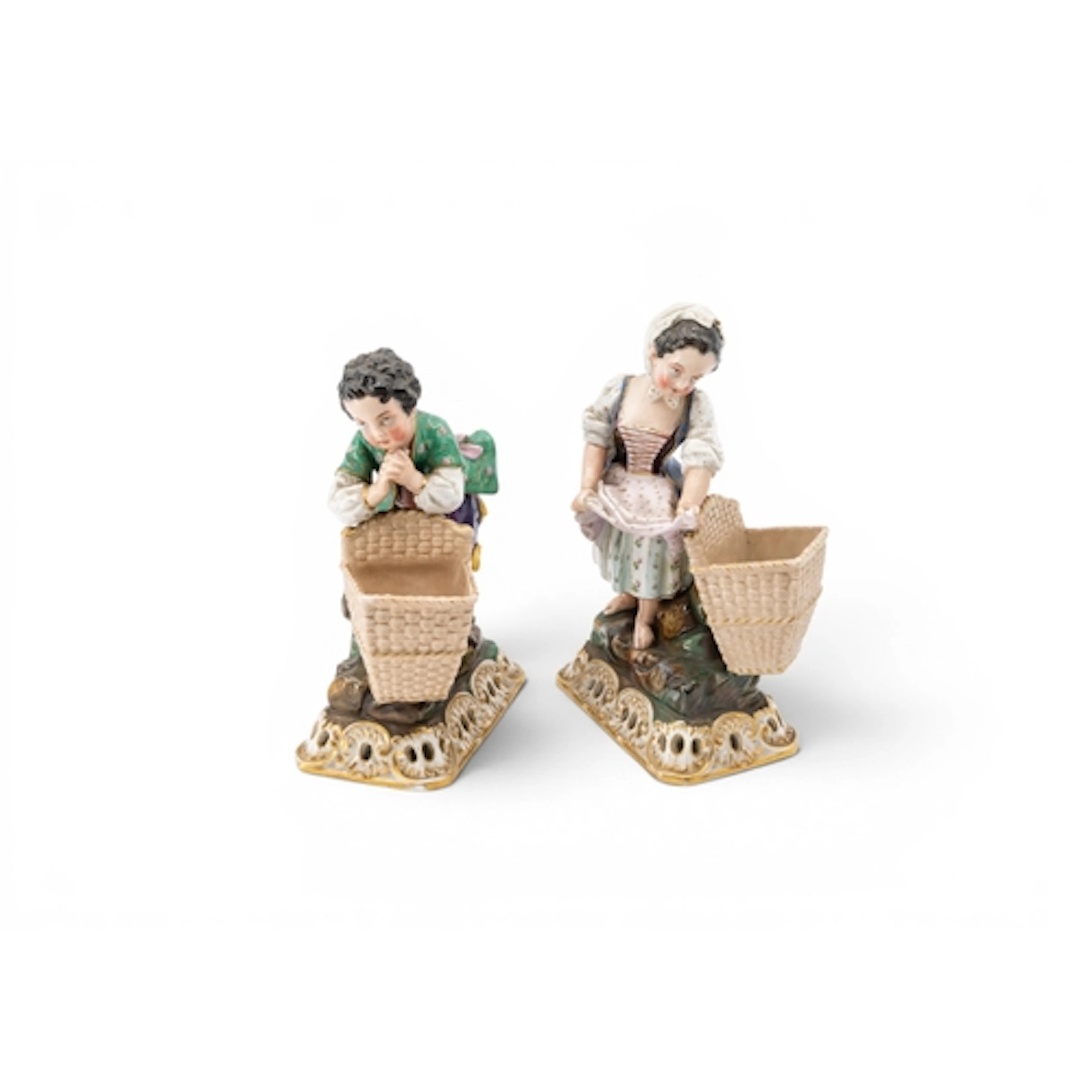 A PAIR OF JACOB PETIT PORCELAIN FIGURES of a girl and boy wi...