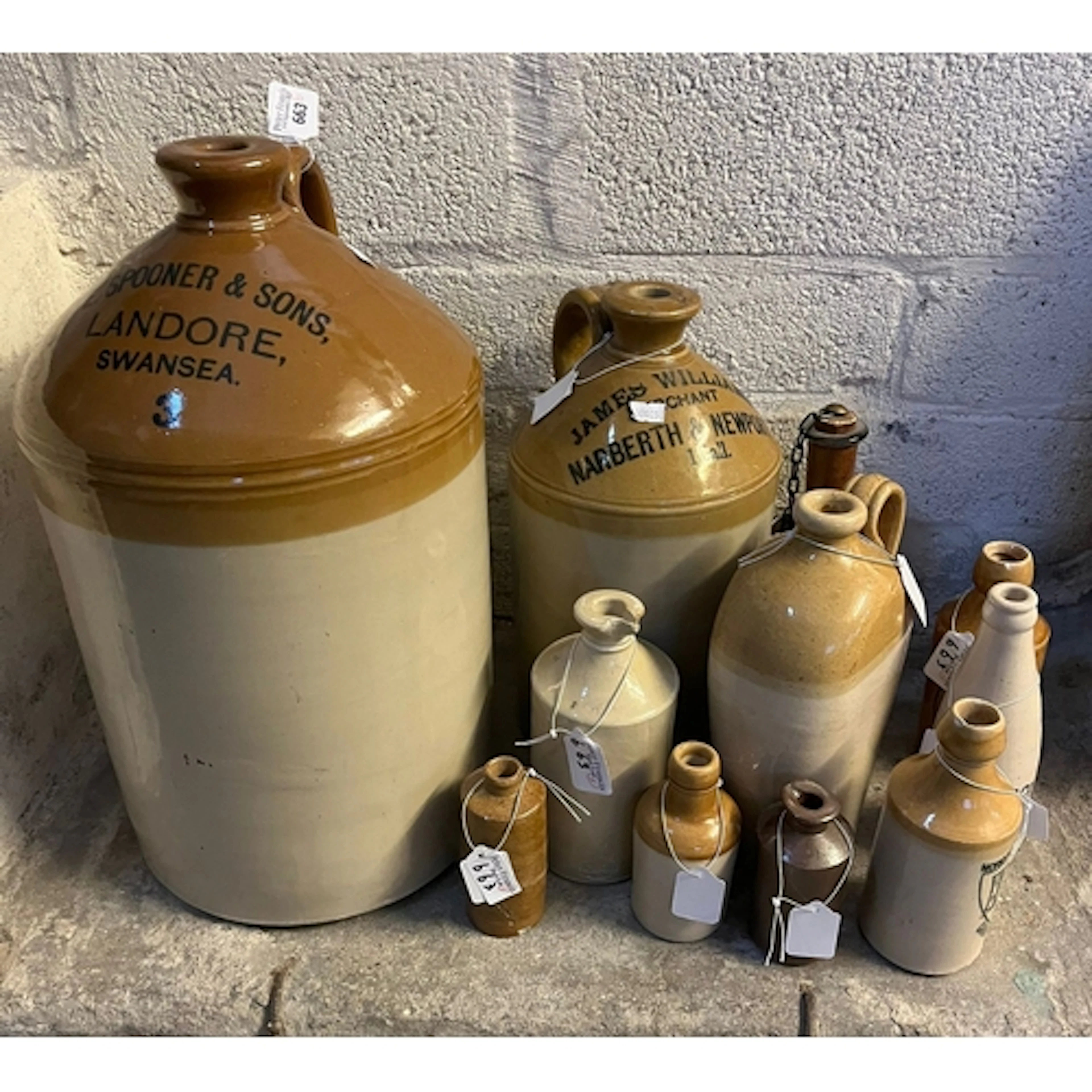Collection of vintage stoneware flagons and similar to inclu...