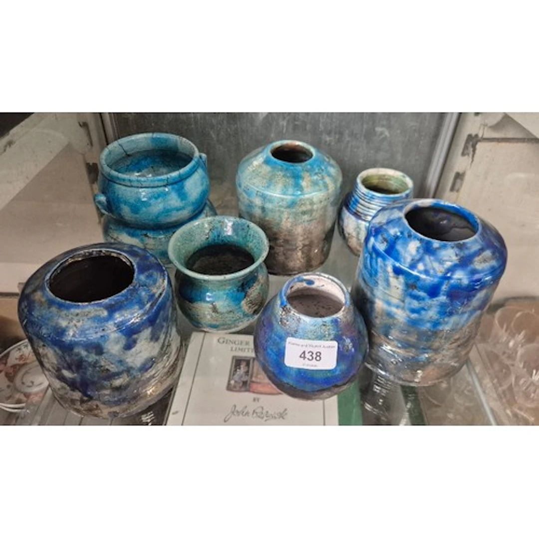 7 pieces of mottled blue/green studio pottery