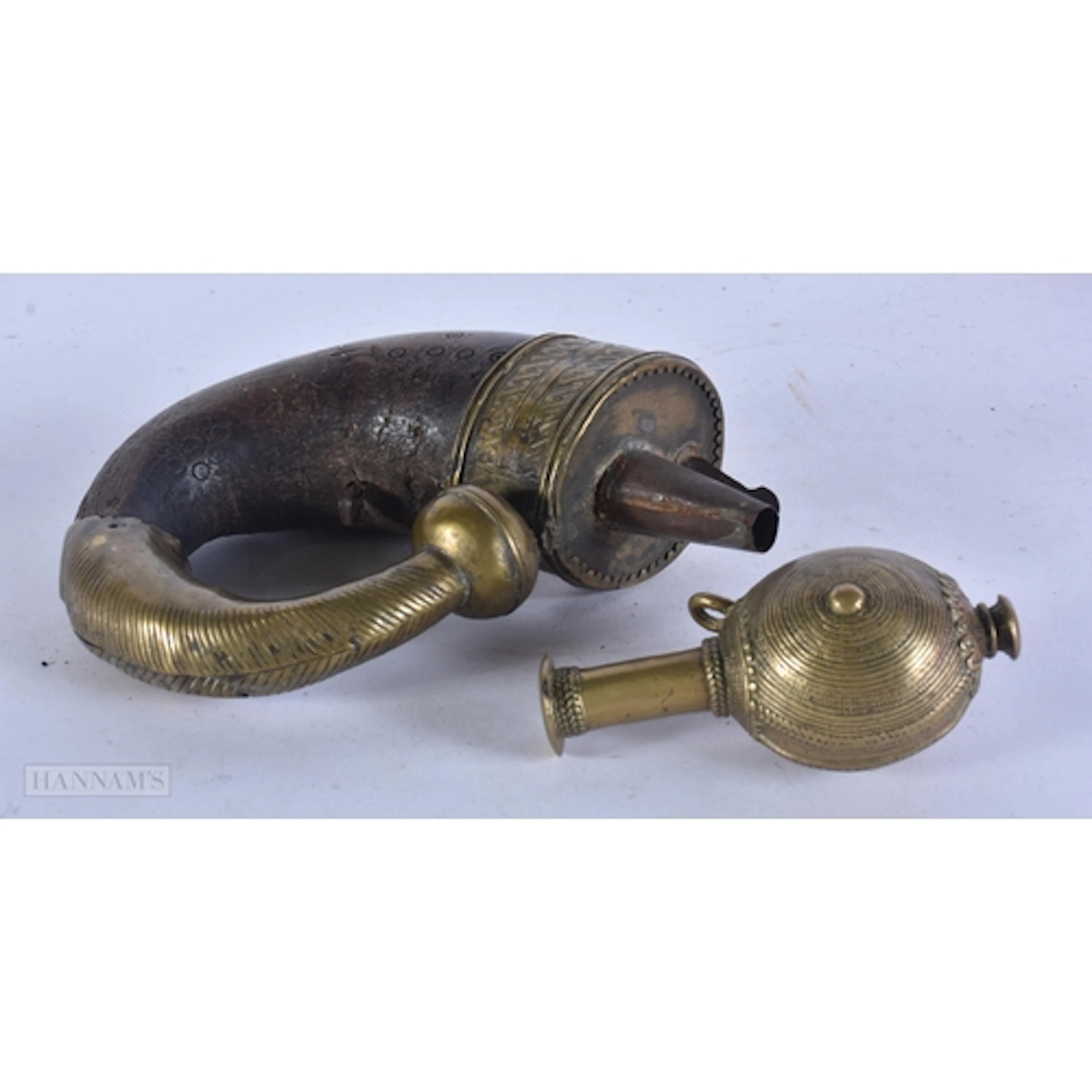 AN EARLY 19TH CENTURY ISLAMIC MIDDLE EASTERN HORN POWDER FLA...