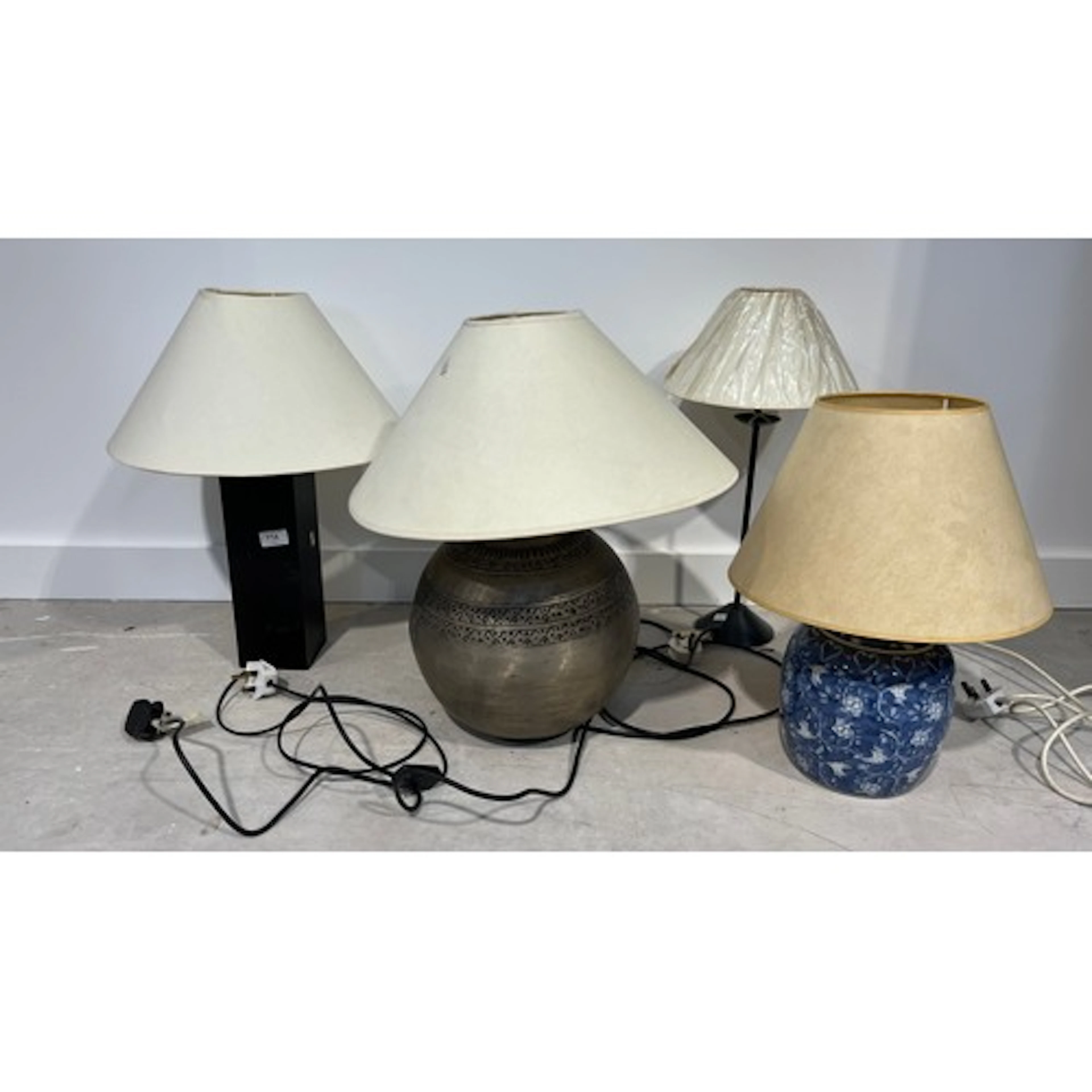 Four table lamps.