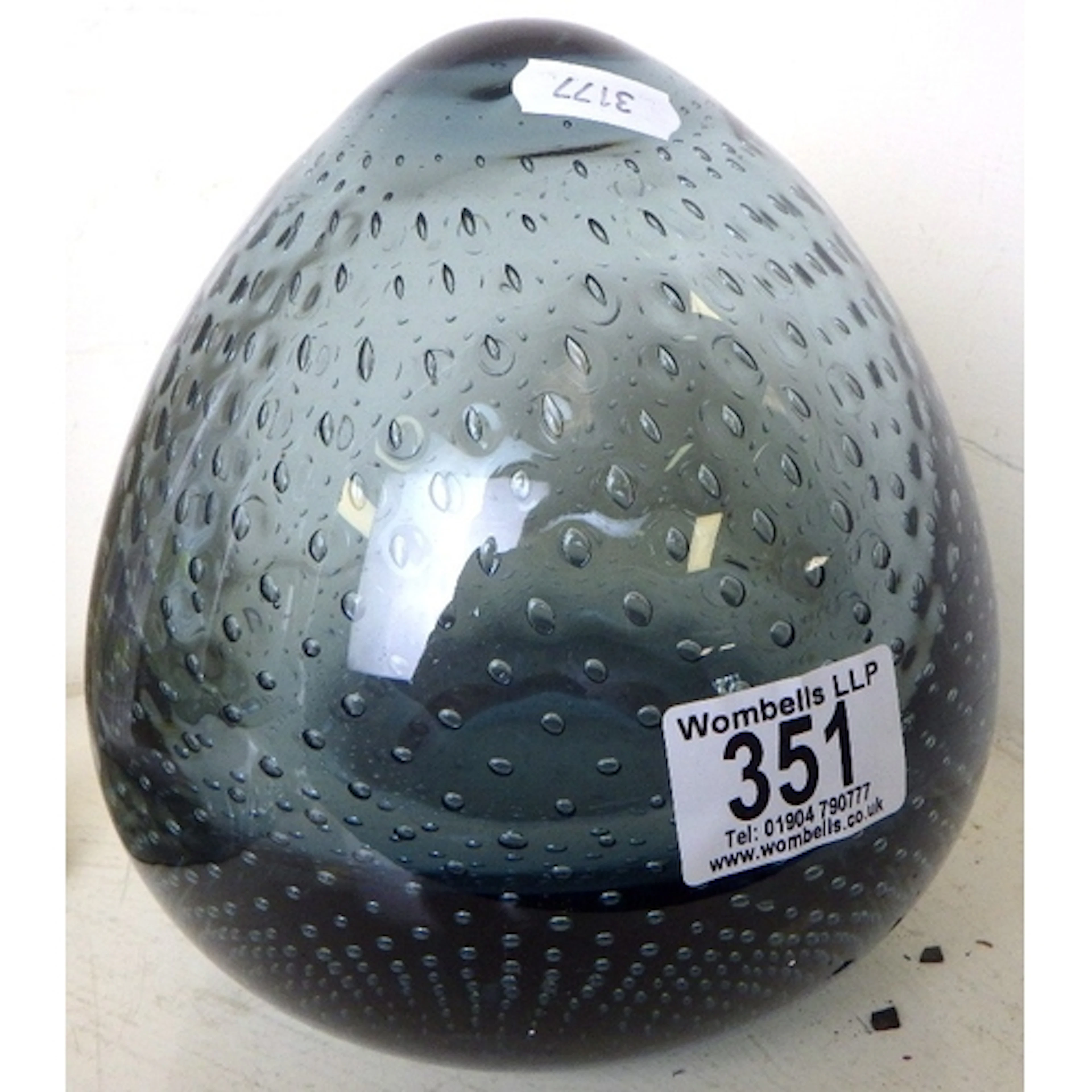A large handblown paperweight