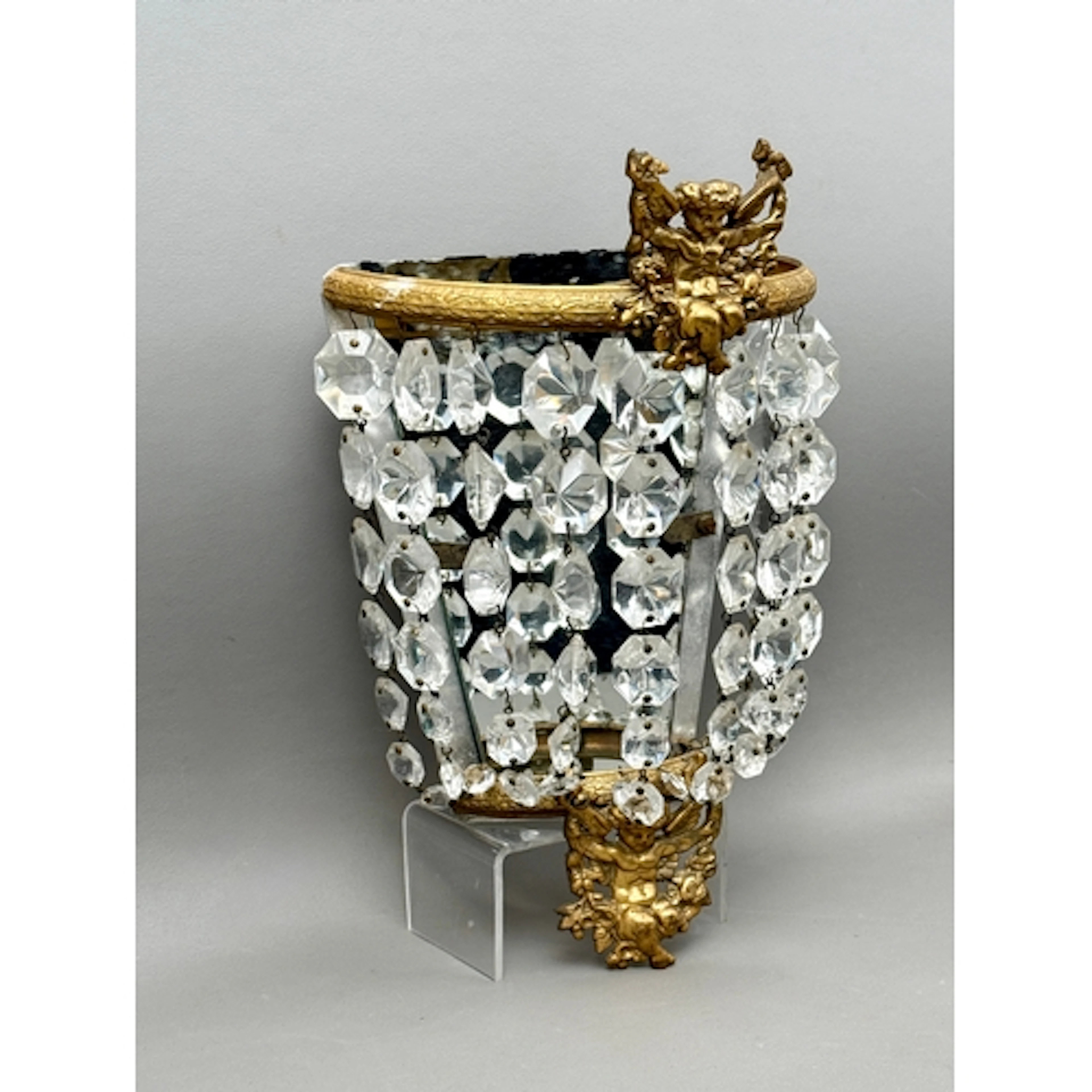 An ormolu and cut glass crystal wall sconce - with French st...