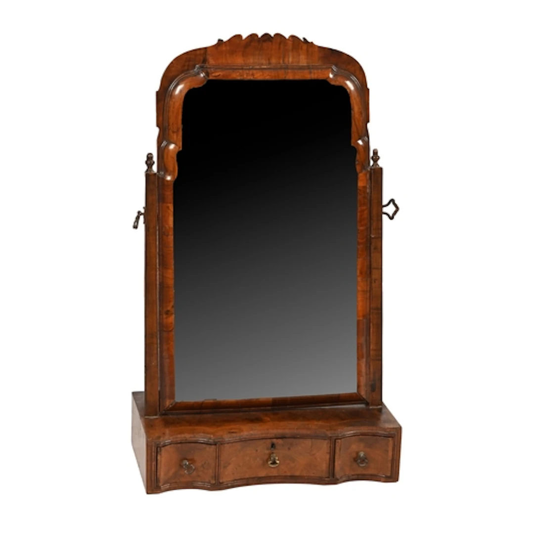 A George II walnut and feather-banded dressing mirror, with ...