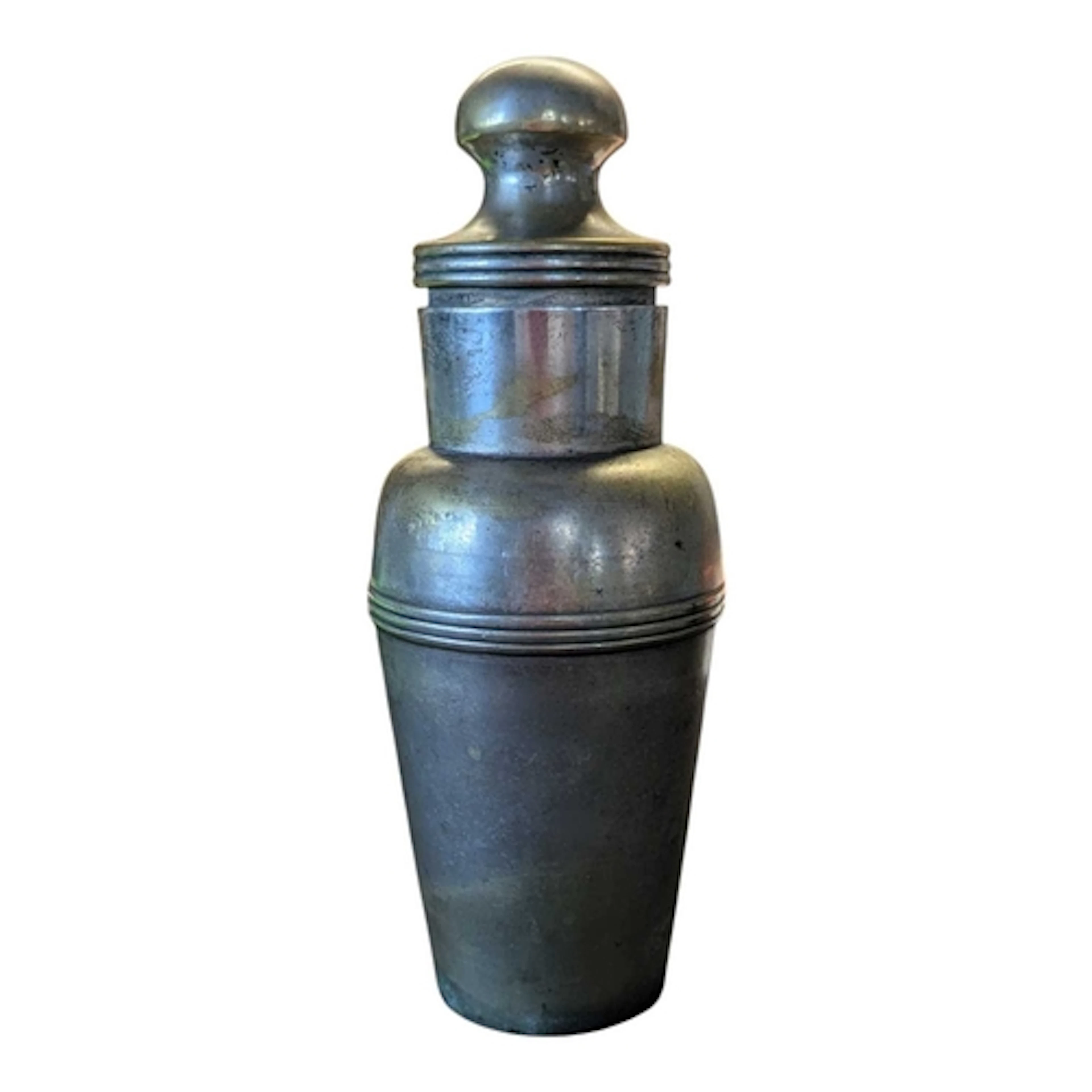 An early 20th century metal cobbler style cocktail shaker. F...