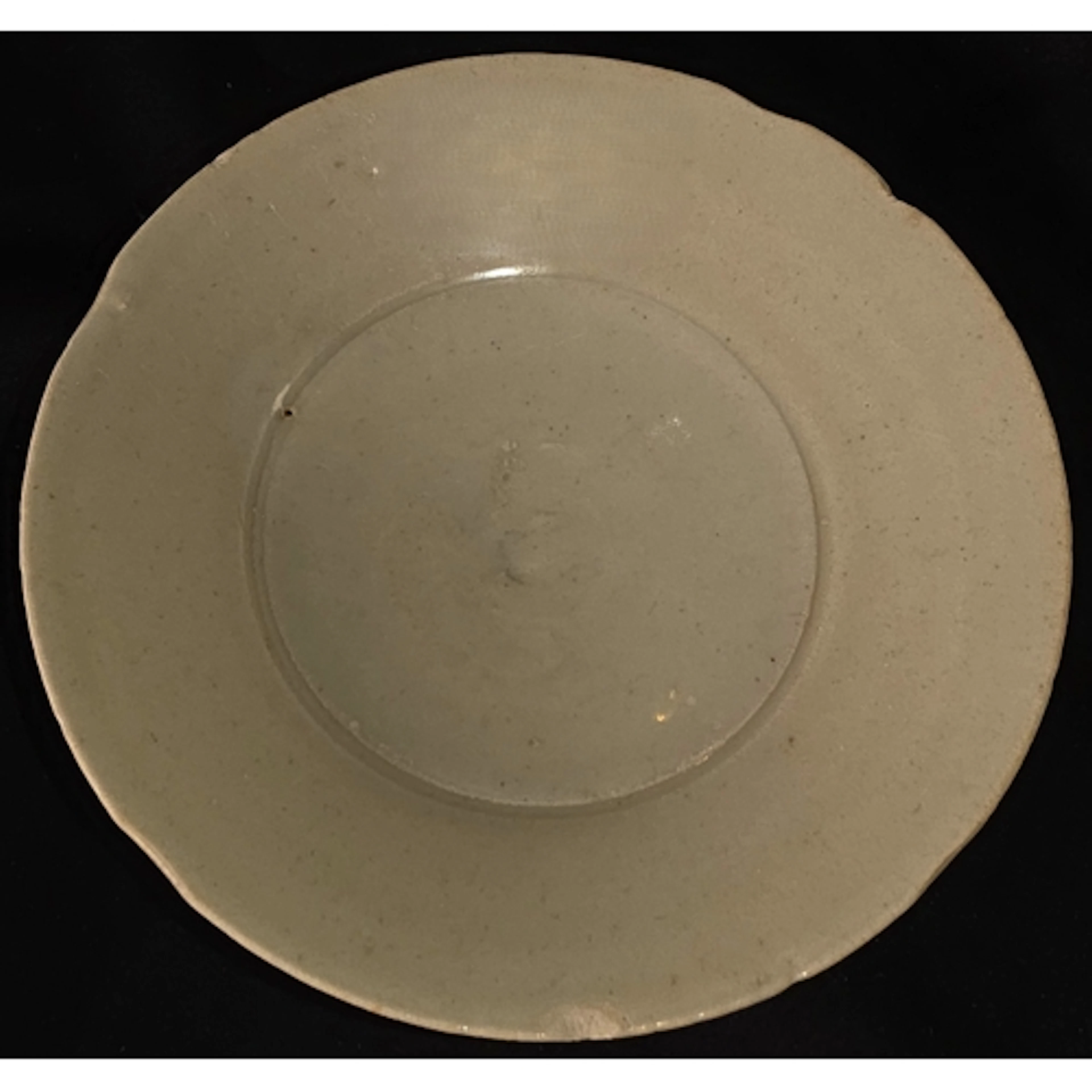 A Chinese Ding type dish with slightly lobbed boarder, diame...