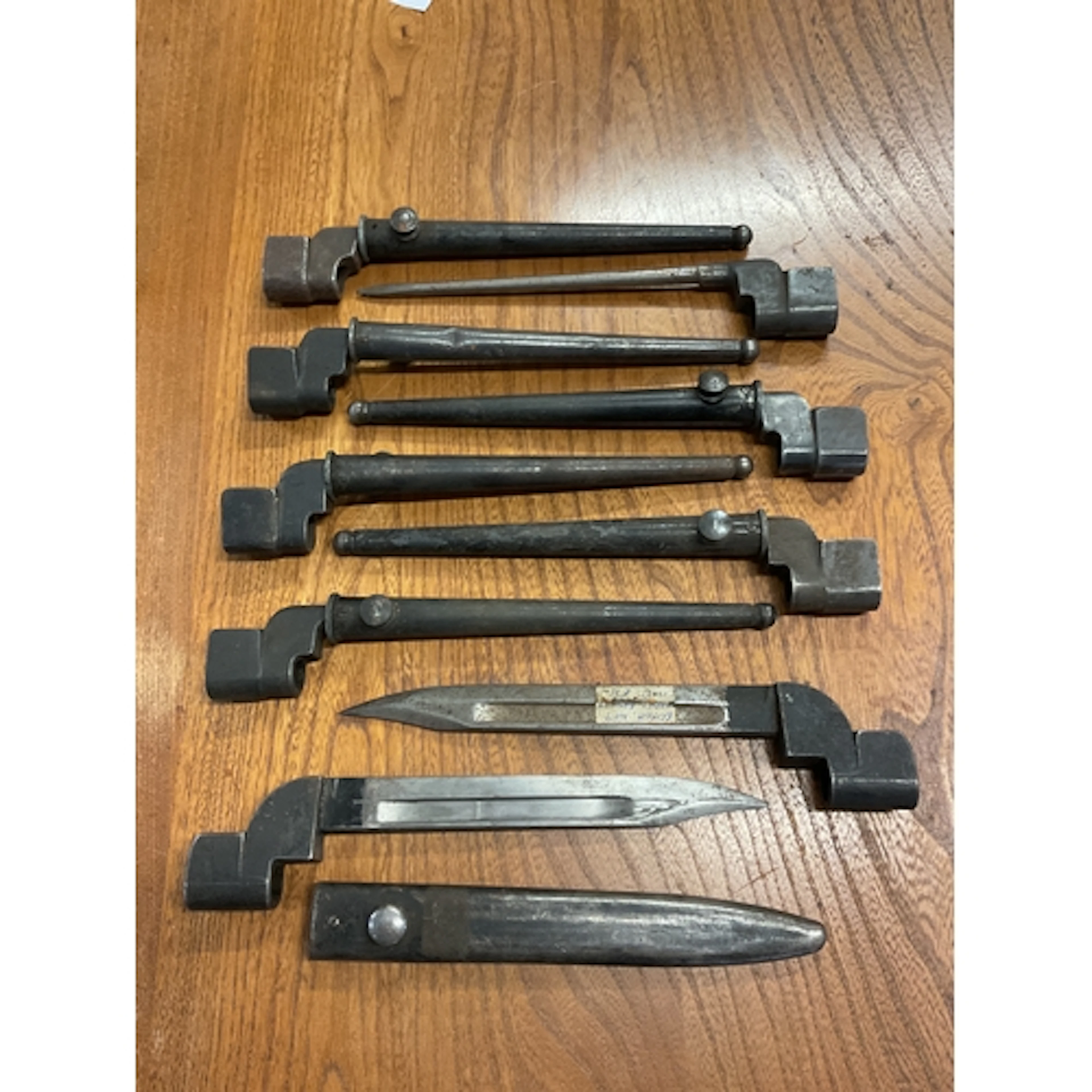 Nine bayonets for WWII Enfield rifle.