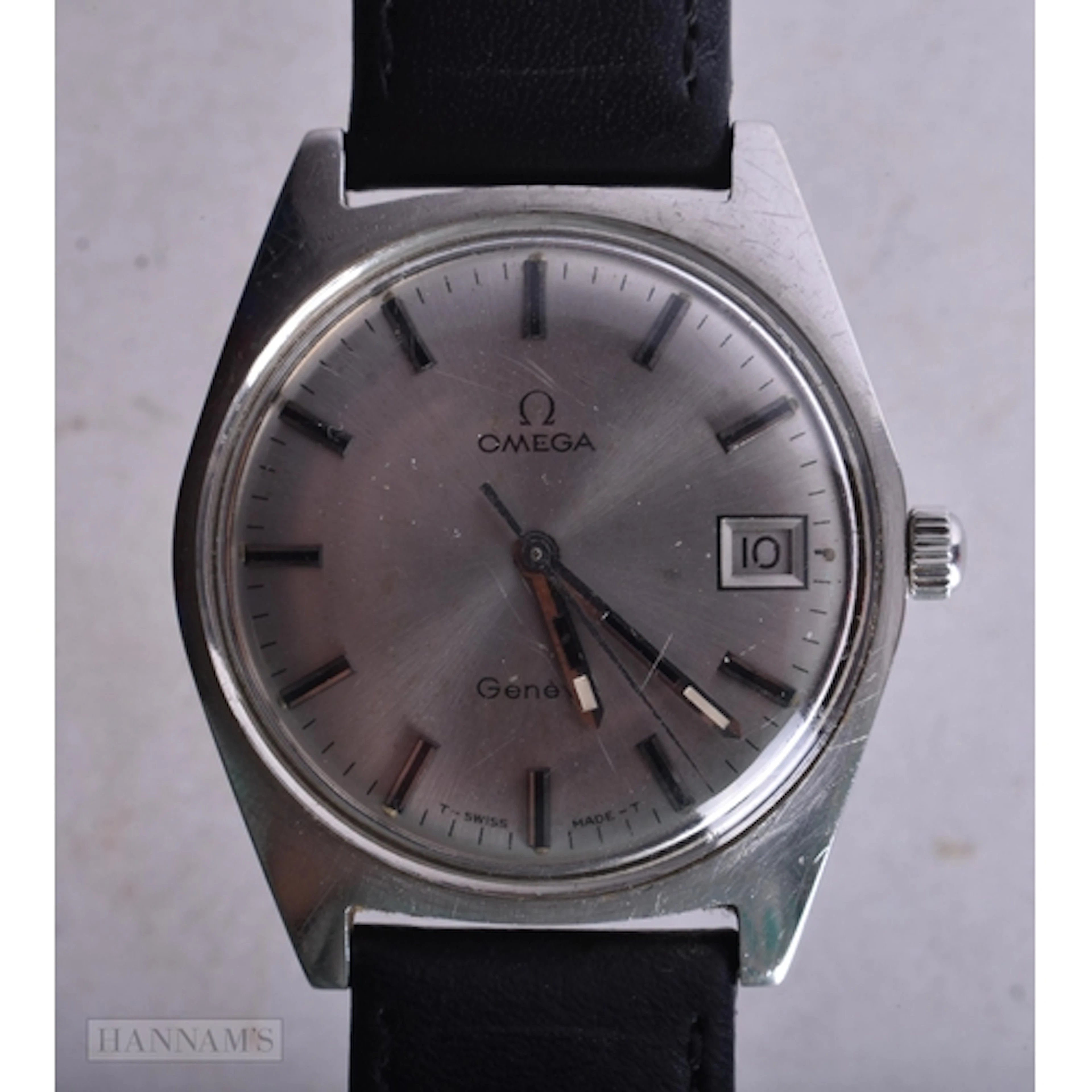 AN OMEGA WRIST WATCH. Running. 3.5 cm wide.