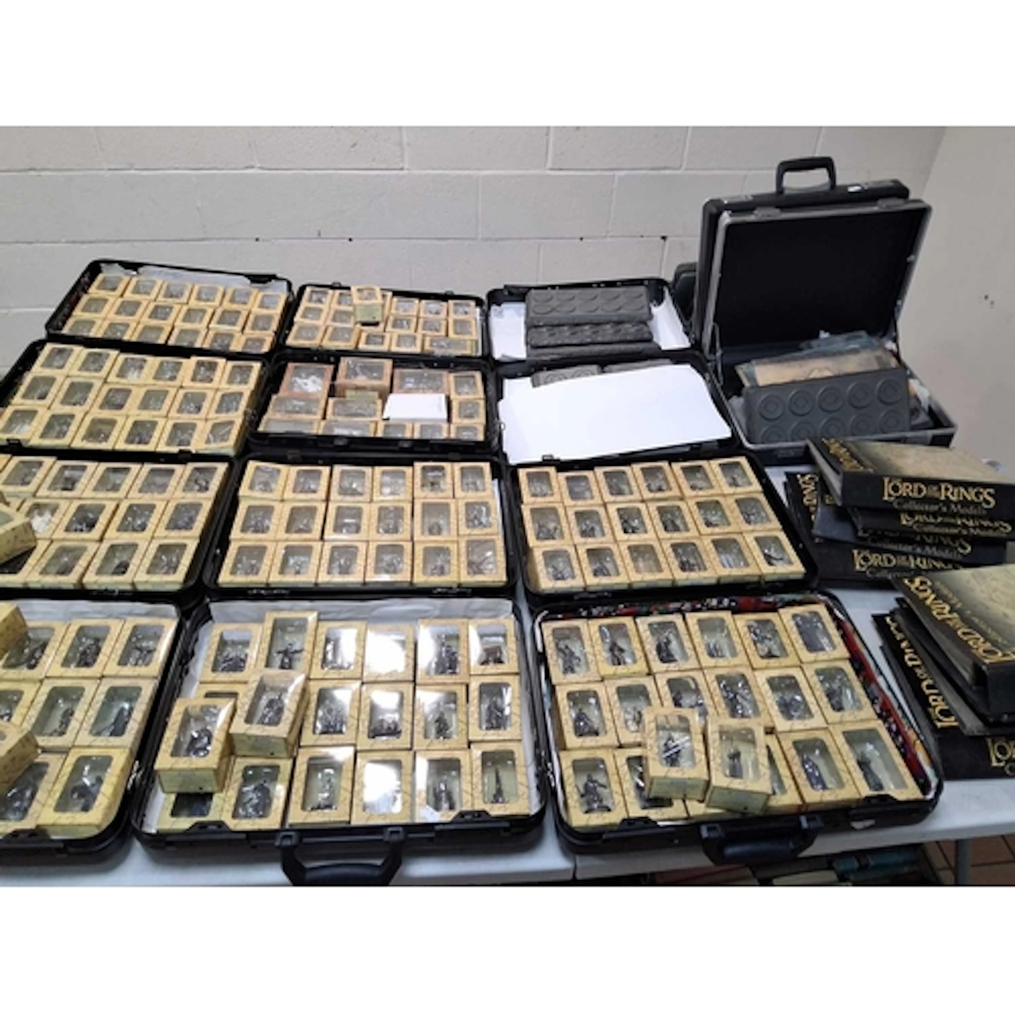 EIGHT CASES OF EAGLEMOSS LORD OF THE RINGS COLLECTOR'S MODEL...