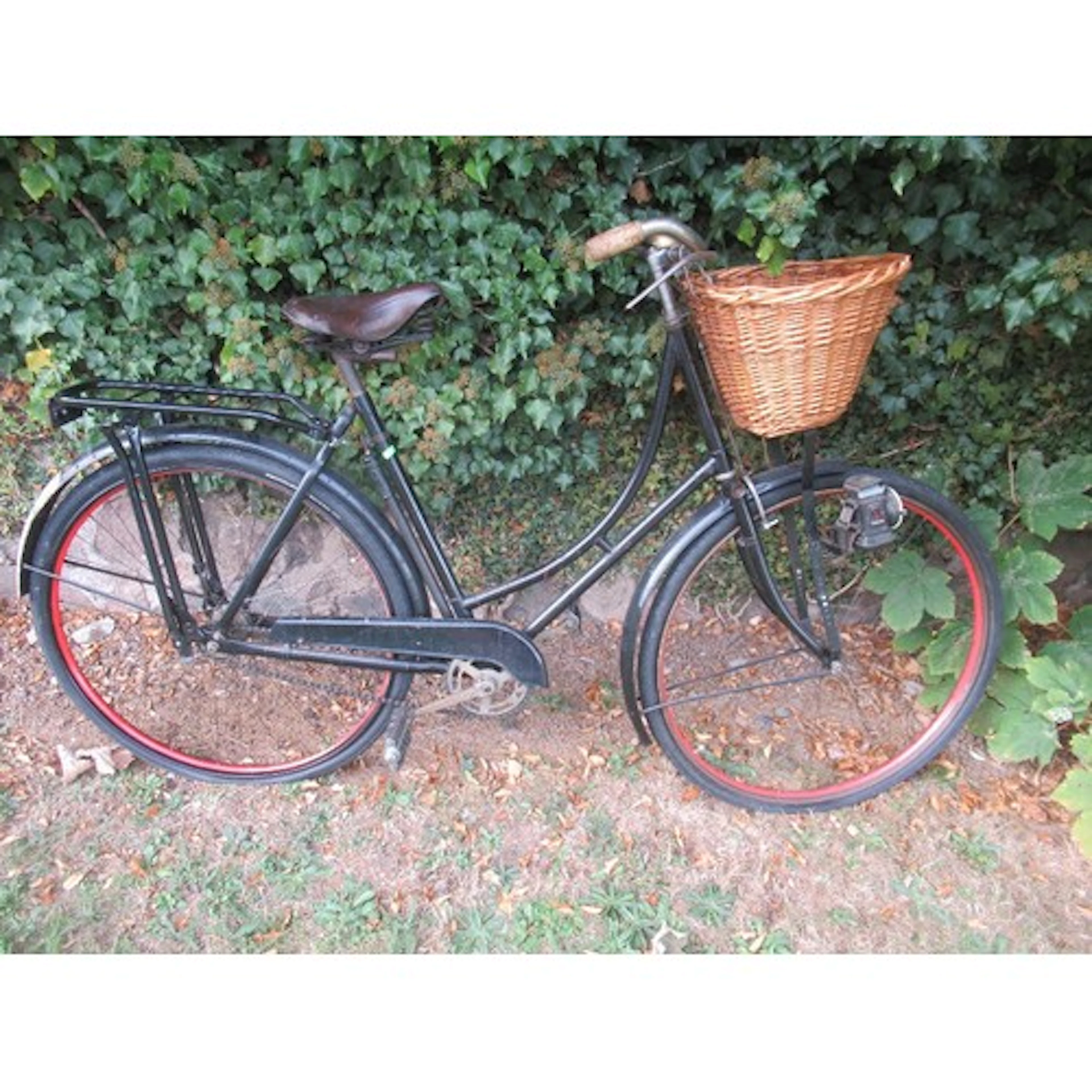 A Vintage Raleigh push bike for decorative purposes only