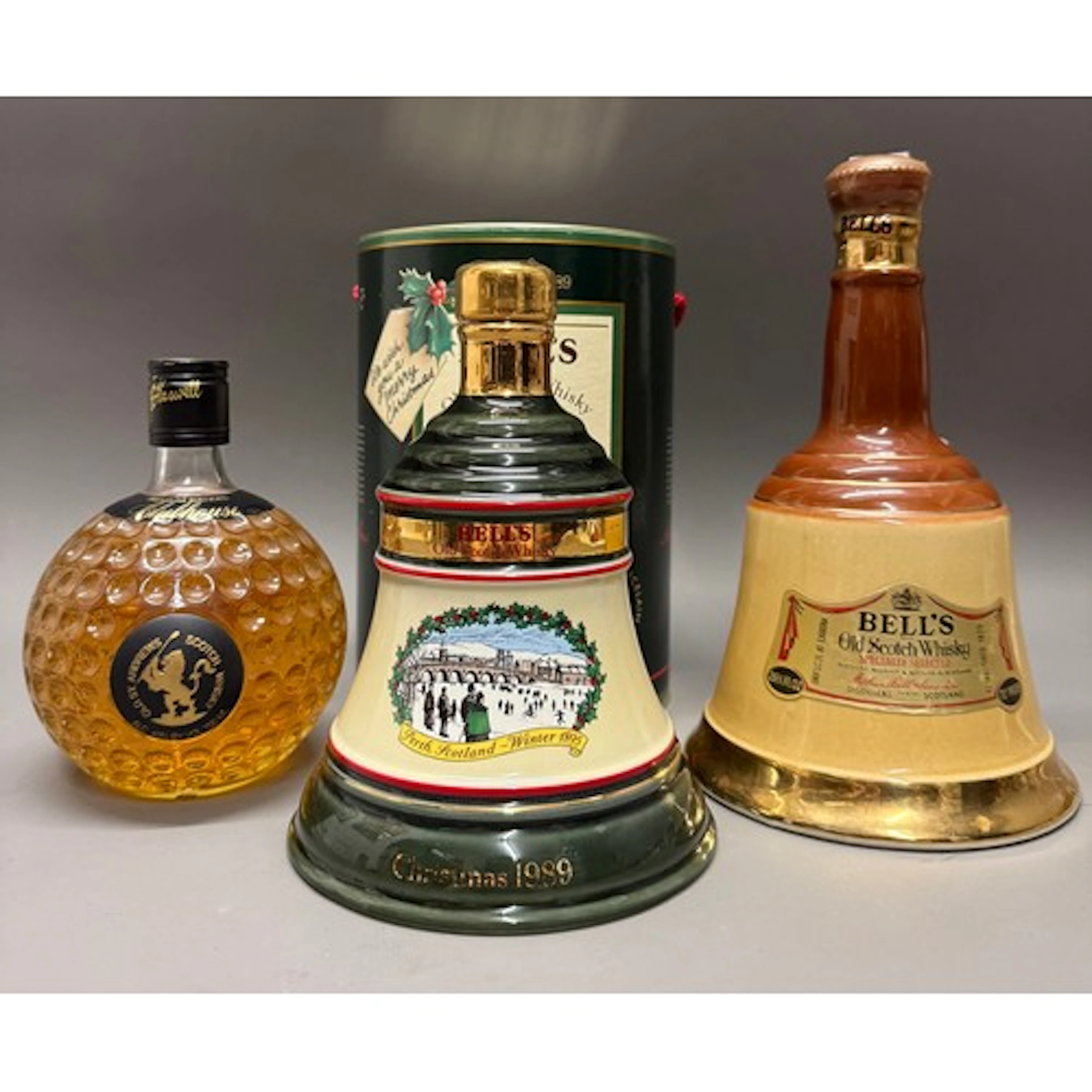 OLD ST ANDREWS CLUBHOUSE blended Scotch whisky held in glass...