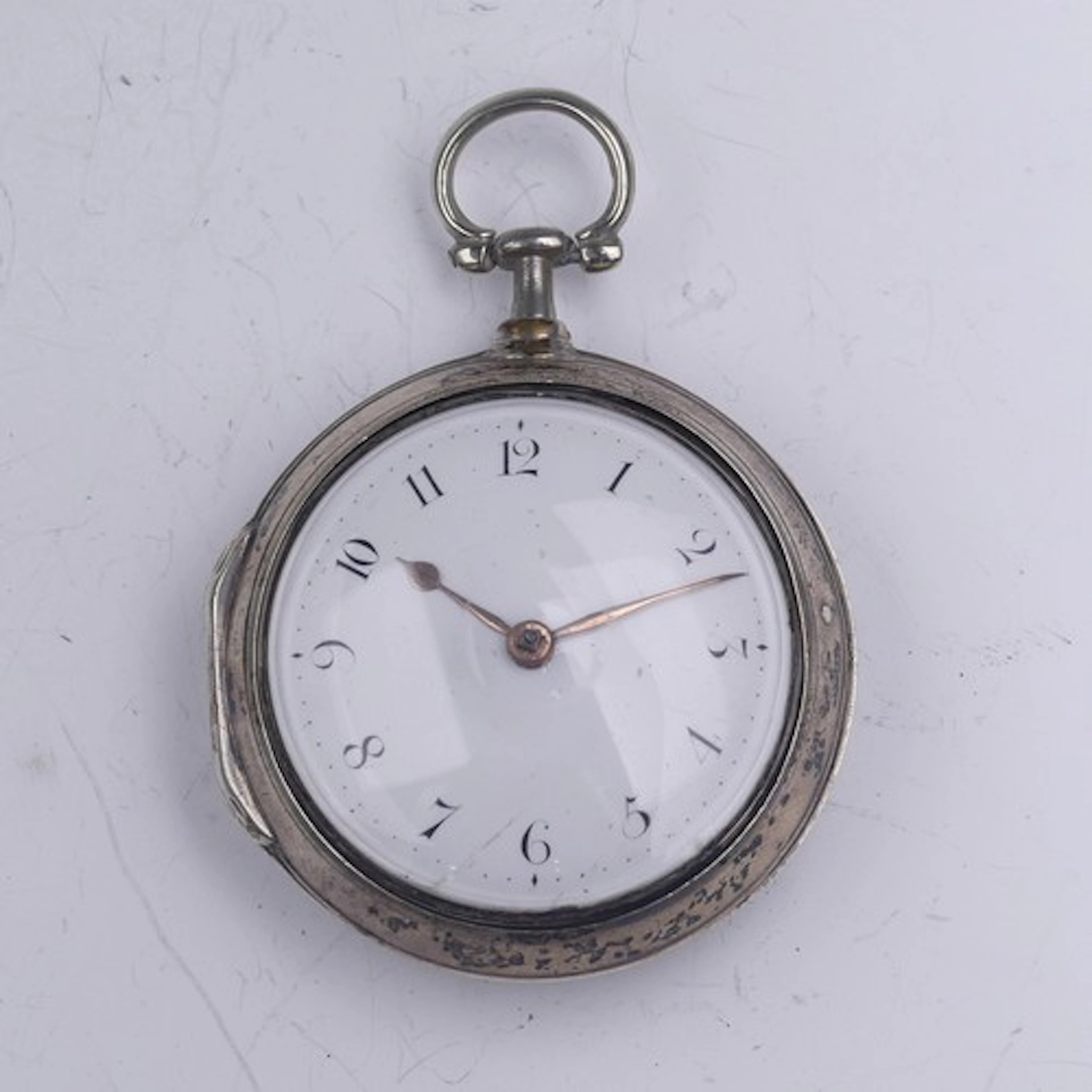 A George III silver pair cased Pocket Watch, the verge fusee...