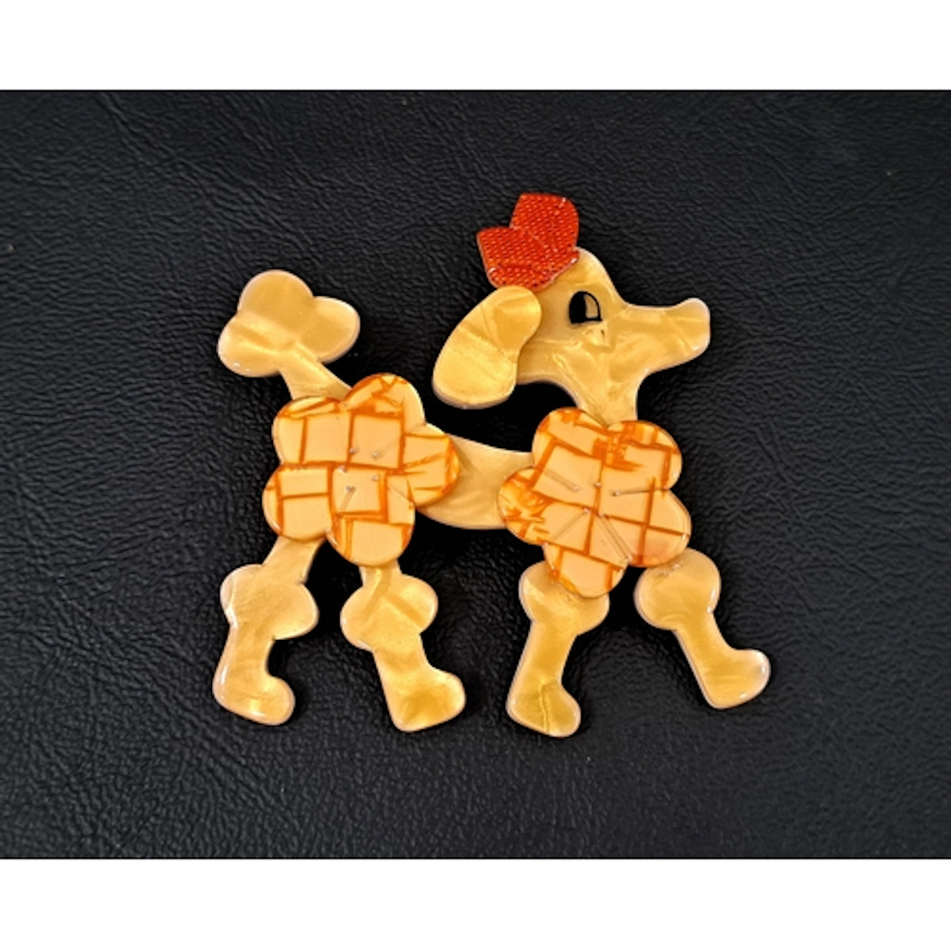 LEA STEIN POODLE DOG BROOCH the opalescent butterscotch colo...